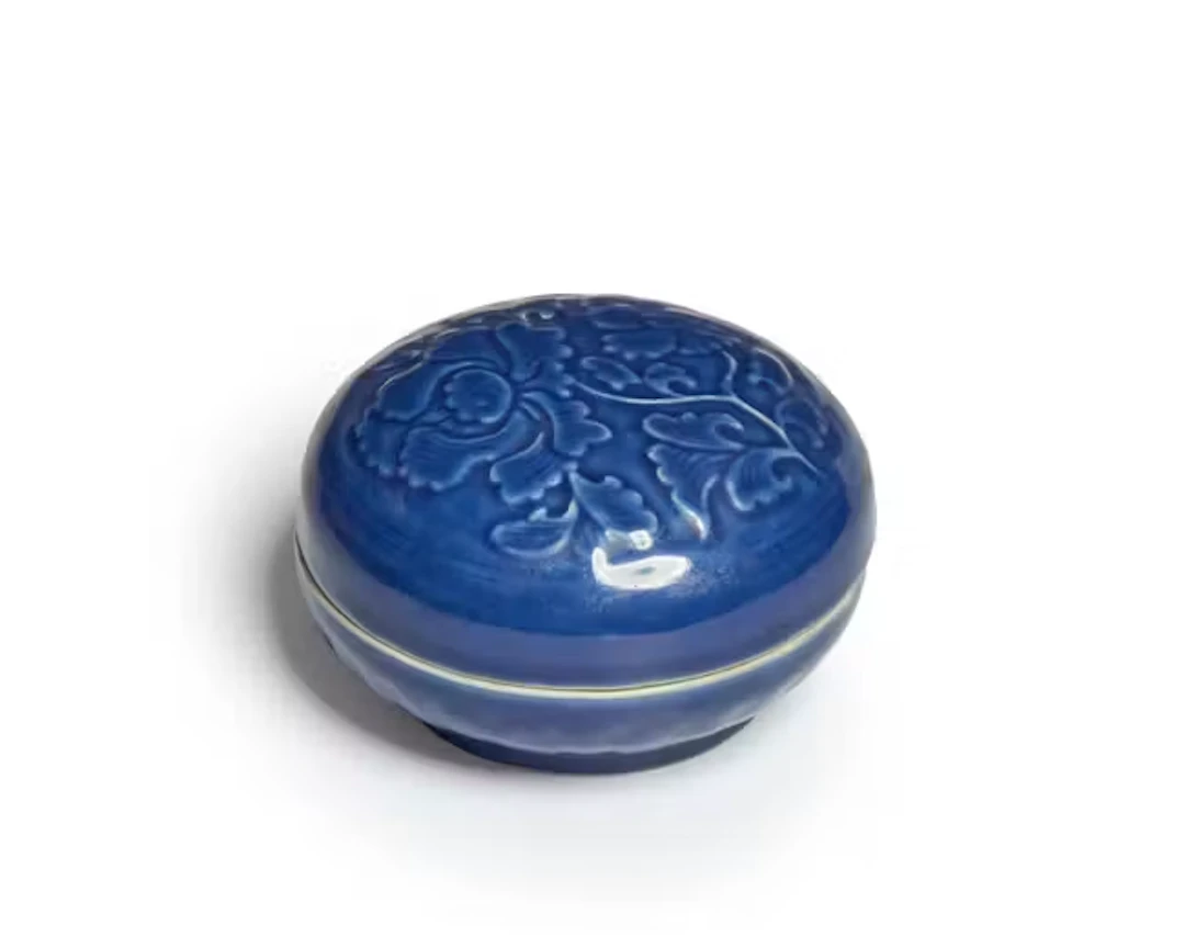 A Chinese blue-glazed moulded box and cover Qing dynasty