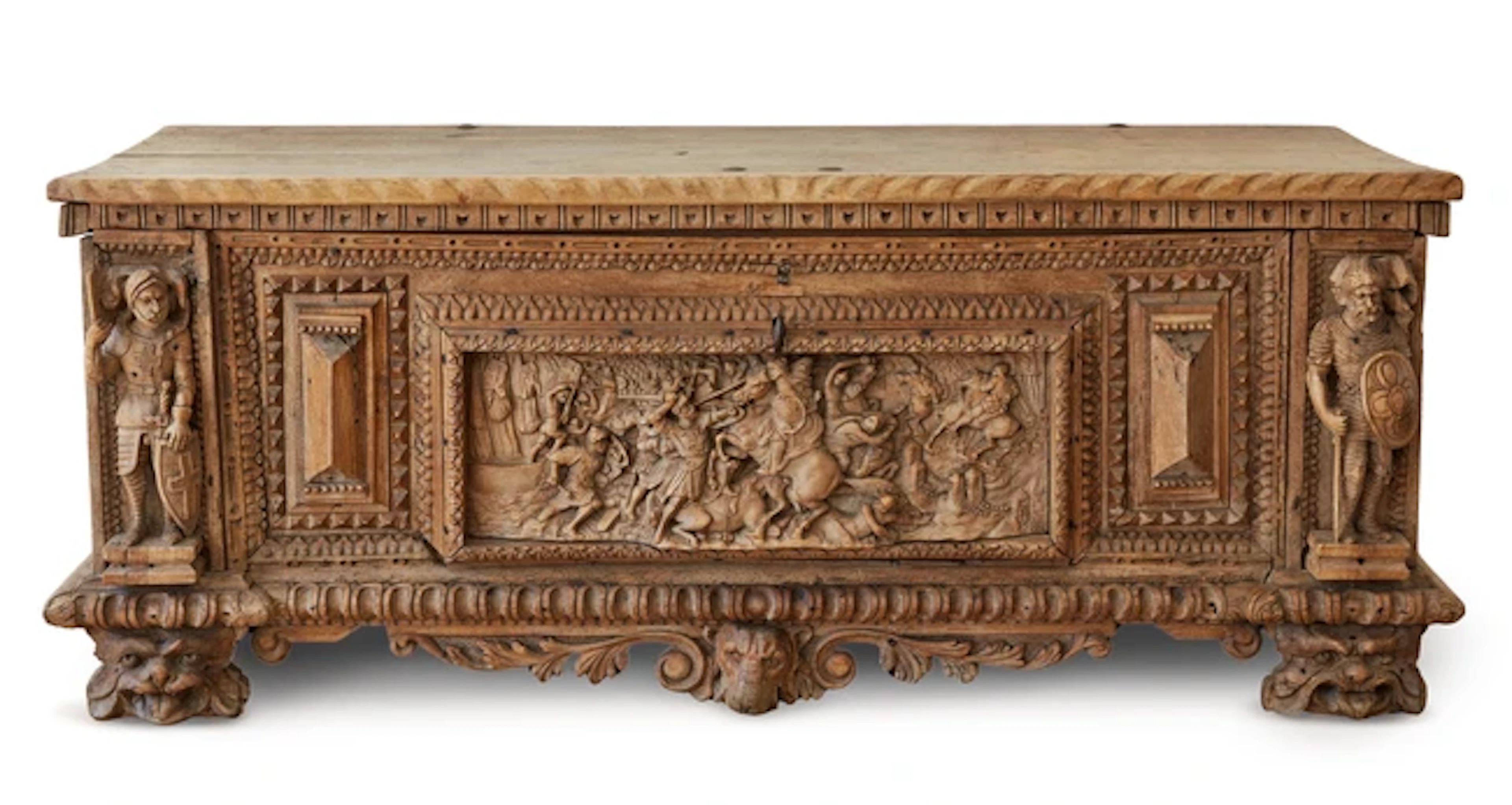 An Italian carved walnut cassone