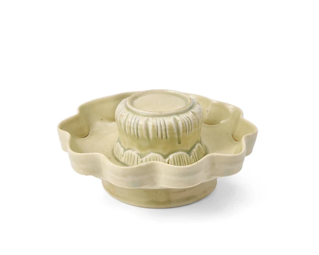 A Chinese qingbai glazed cup stand Song/Yuan dynasty...