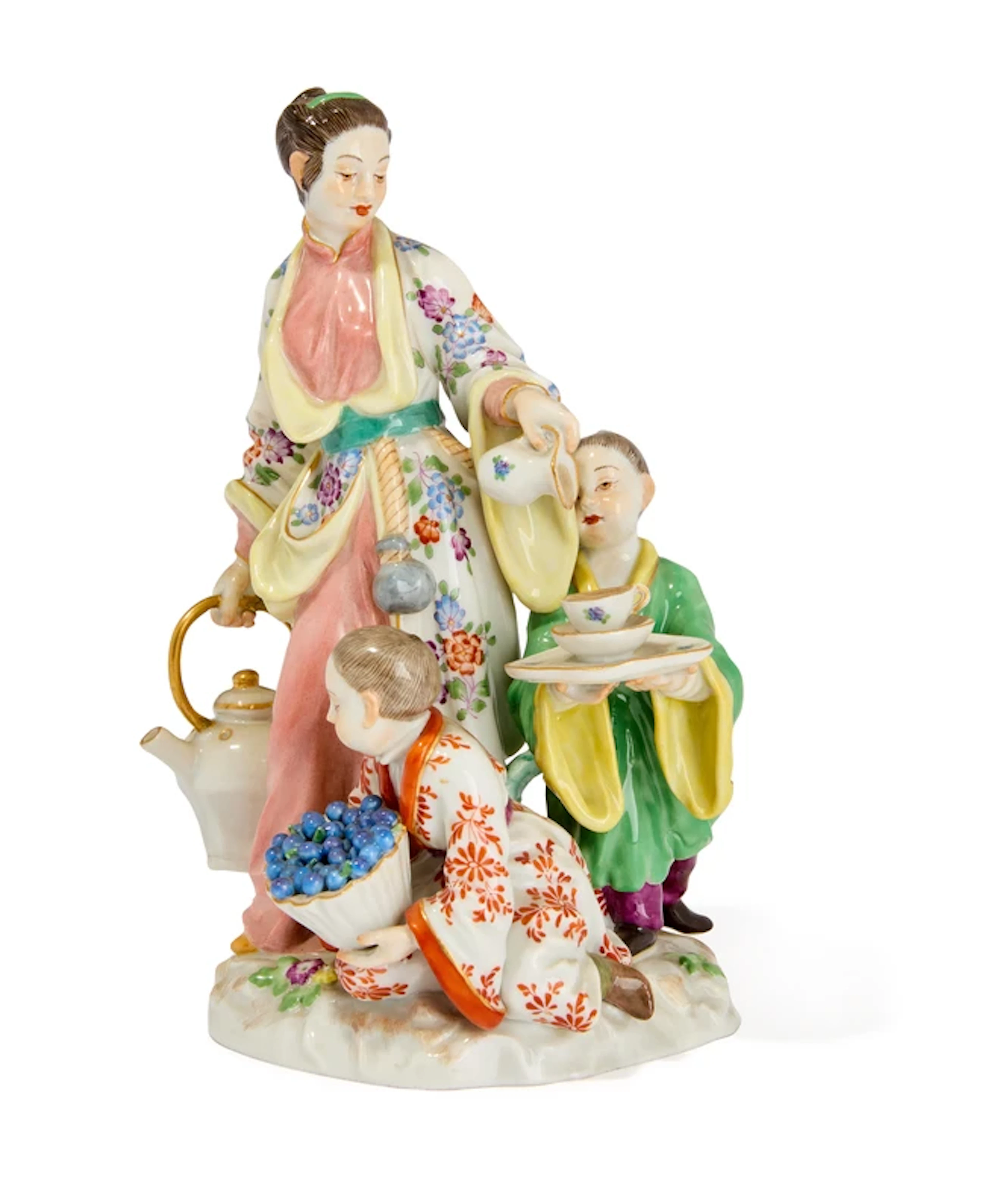 A Meissen porcelain figure group of a Japanese woman with children