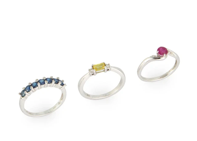 Three 9ct white gold gem-set rings