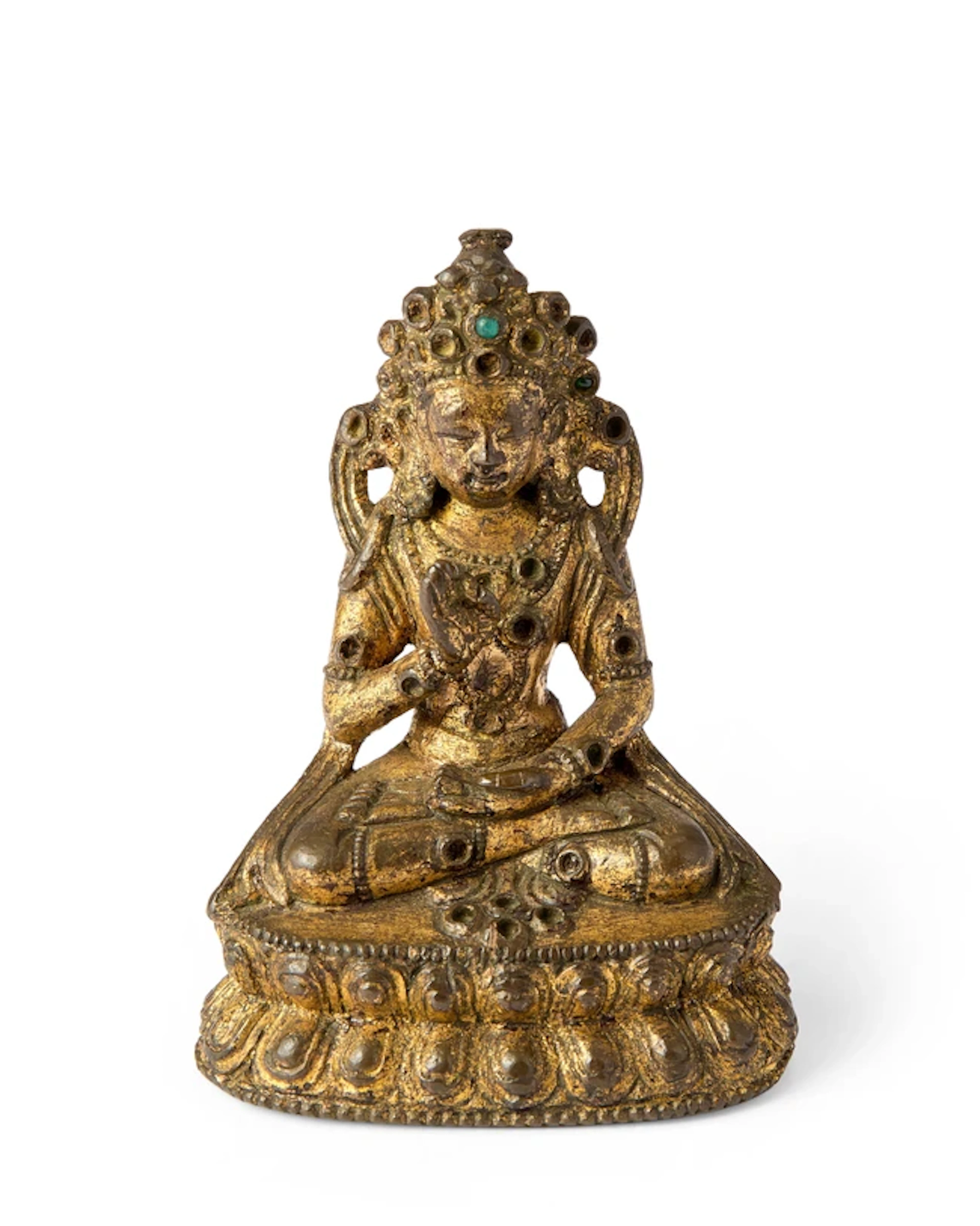 A Chinese gilt-bronze figure of Amoghasiddhi Ming dynasty