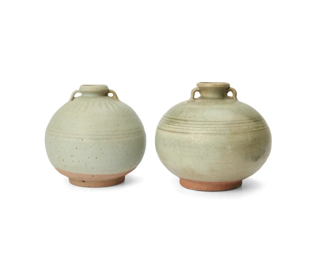 A pair of Sukhothai celadon-glazed jars 15th century Each...