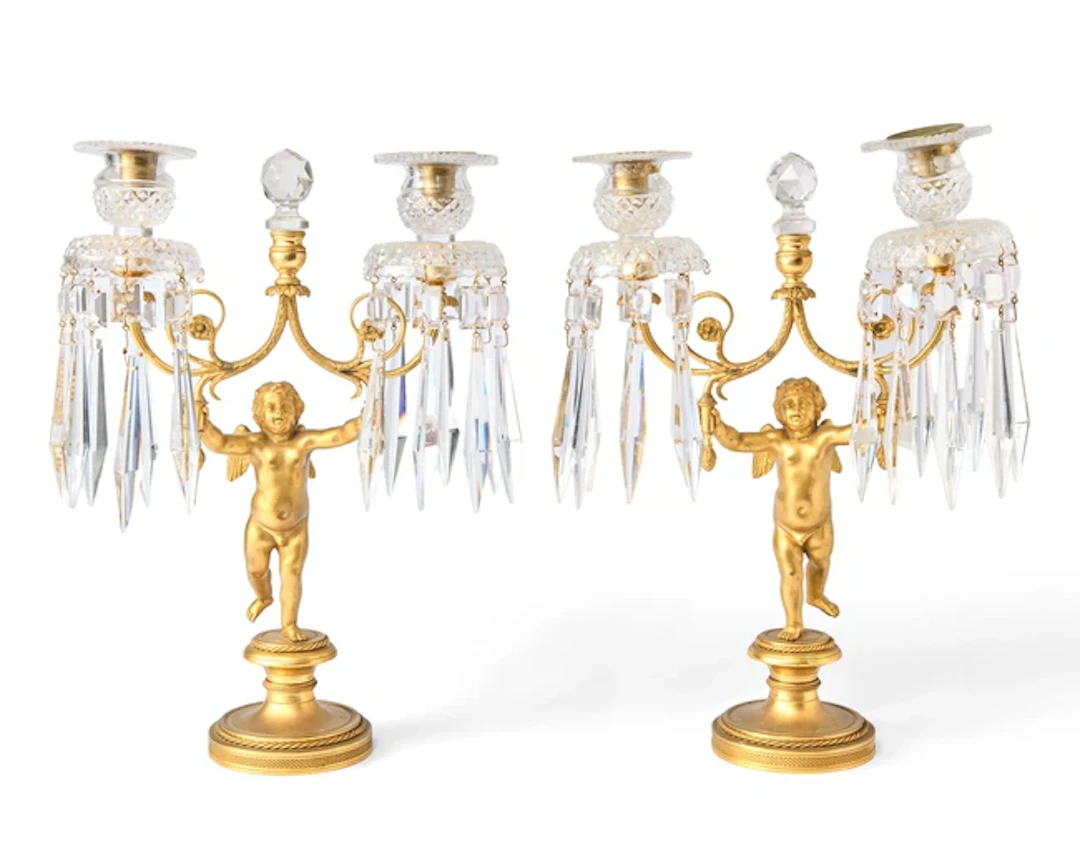 A pair of gilt-bronze twin-light candelabra