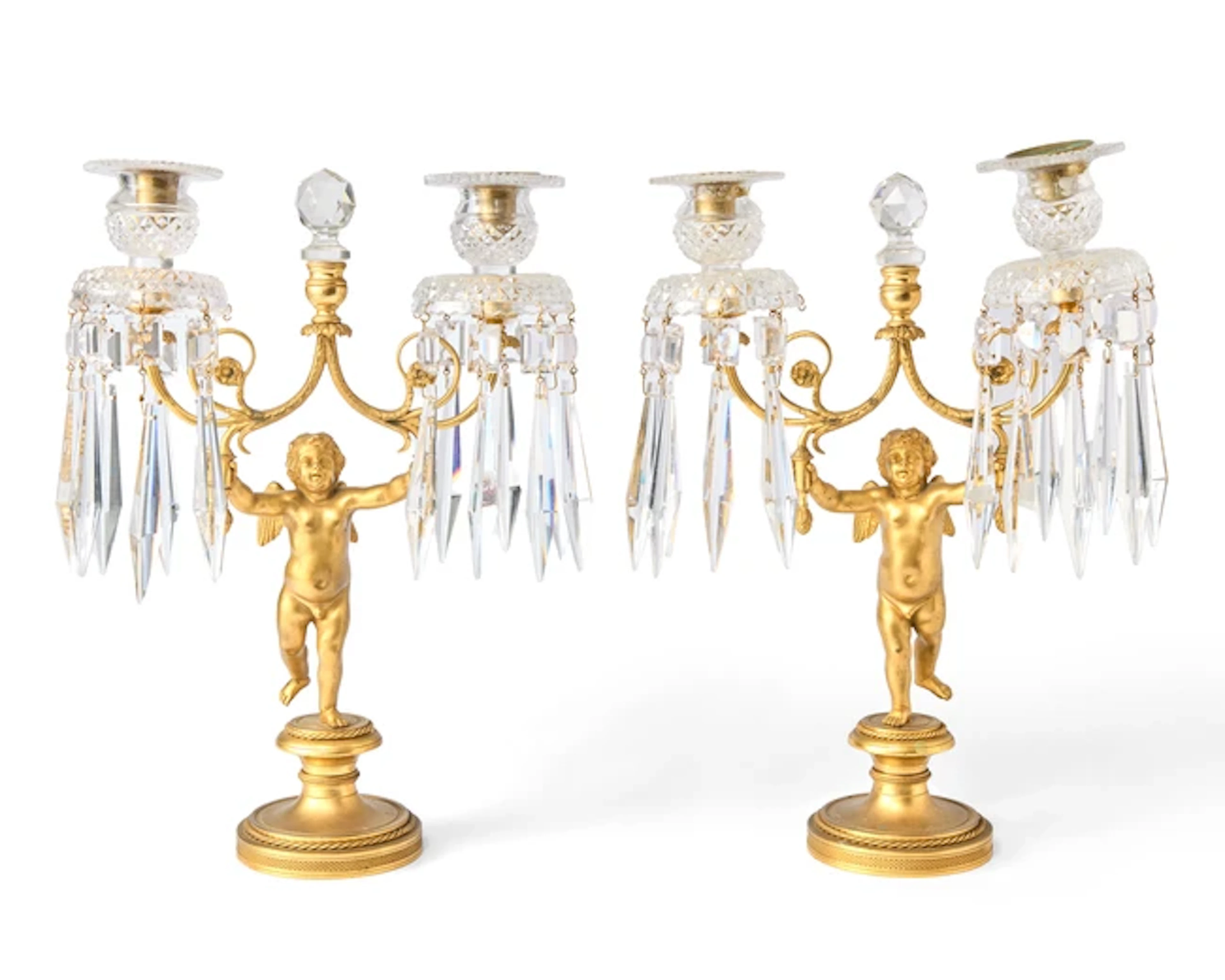 A pair of gilt-bronze twin-light candelabra