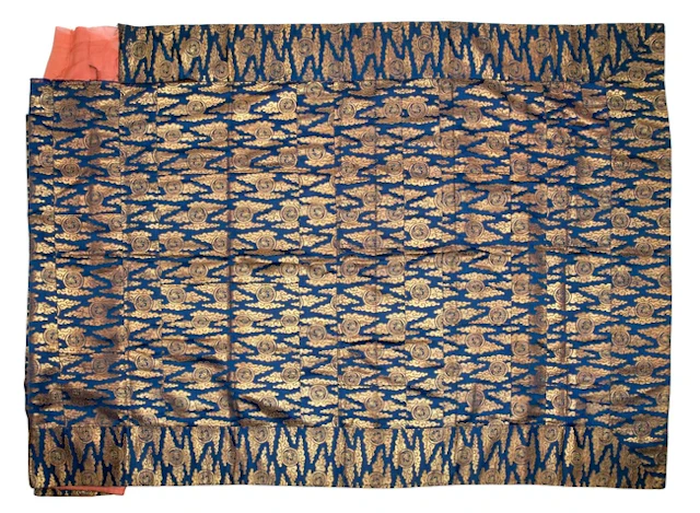 A Japanese blue silk and gold thread brocade Buddhist monk's robe