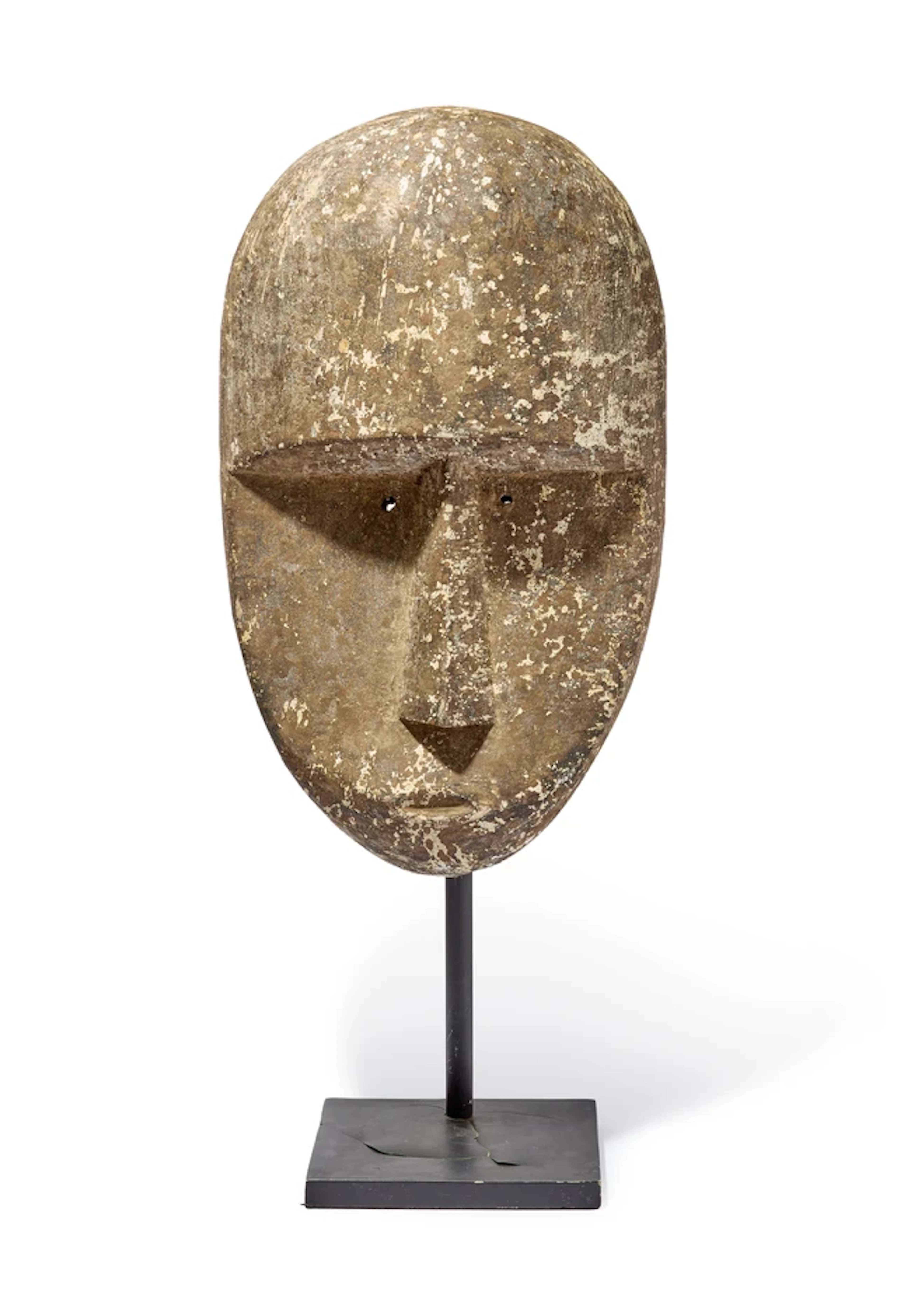 A large modern South-East-Asian style wood mask