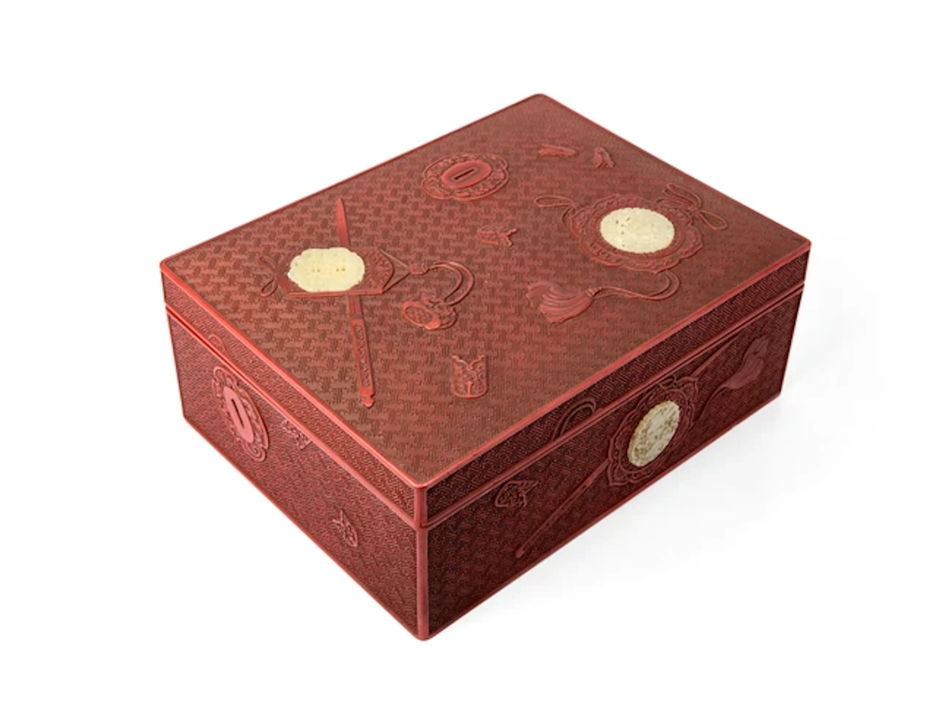 A large Japanese jade-inset carved cinnabar lacquer box and cover Edo period