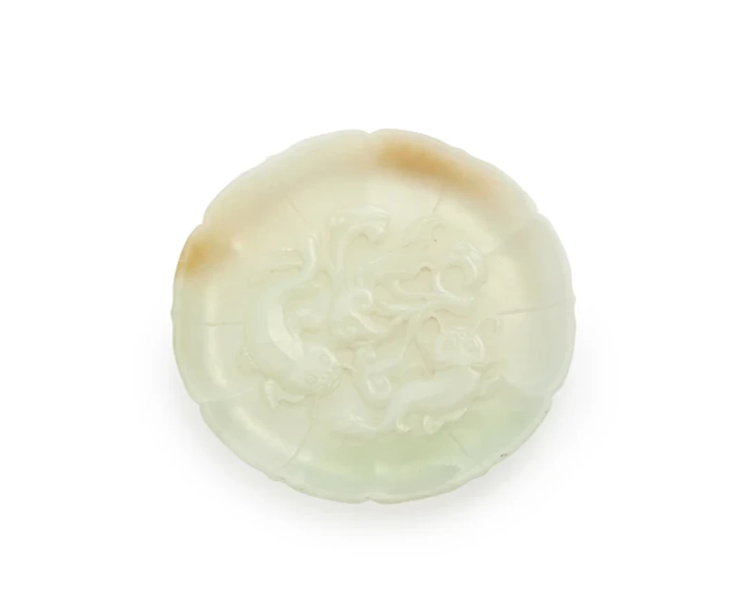 A Chinese white jade 'carps and lingzhi' dish Mid-20th century
