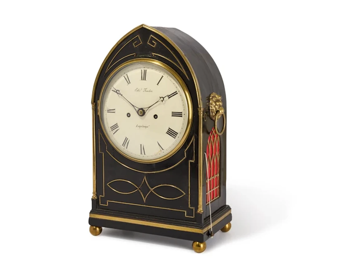 A Regency brass-mounted ebonised bracket clock