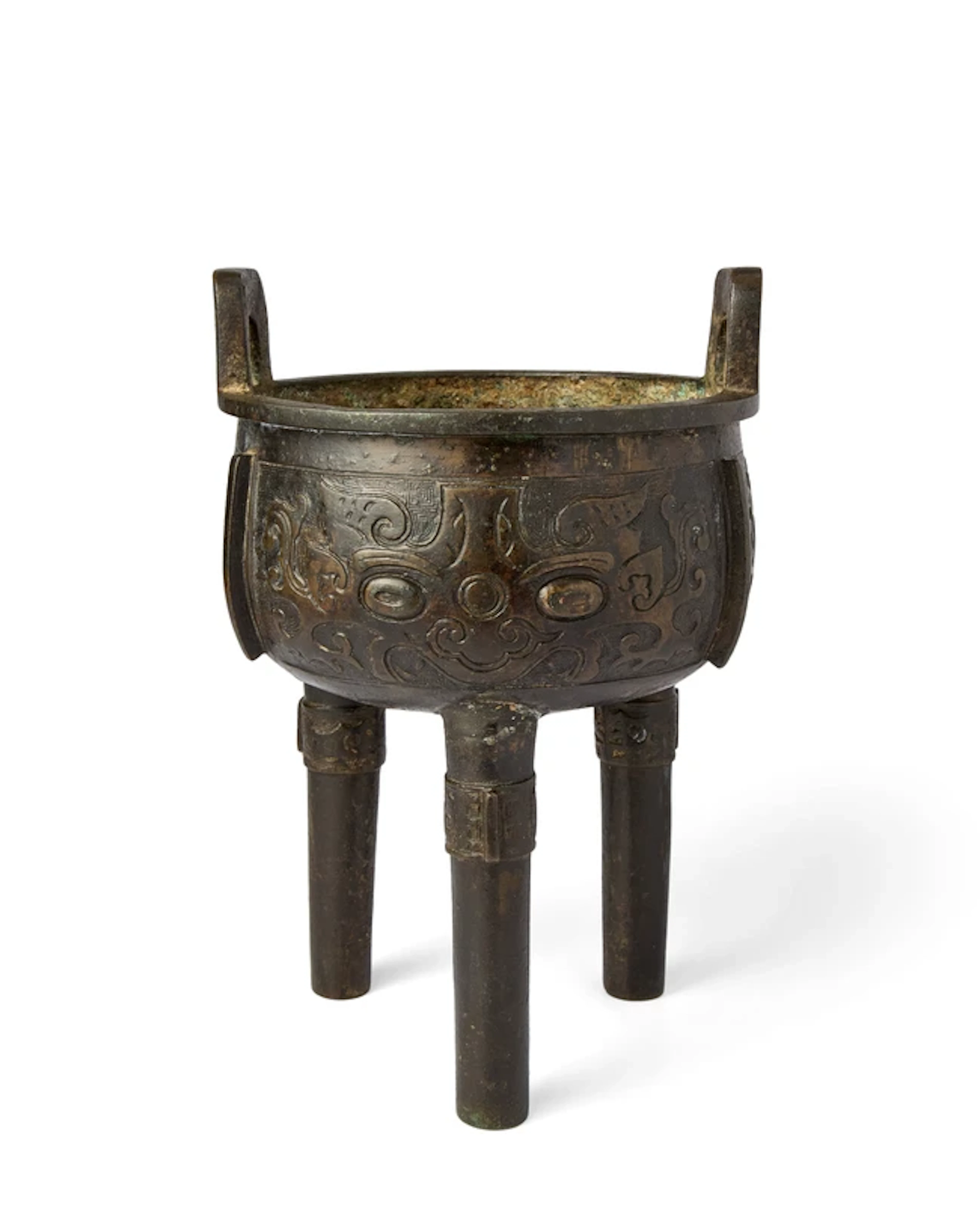 A Chinese bronze 'taotie' tripod incense burner