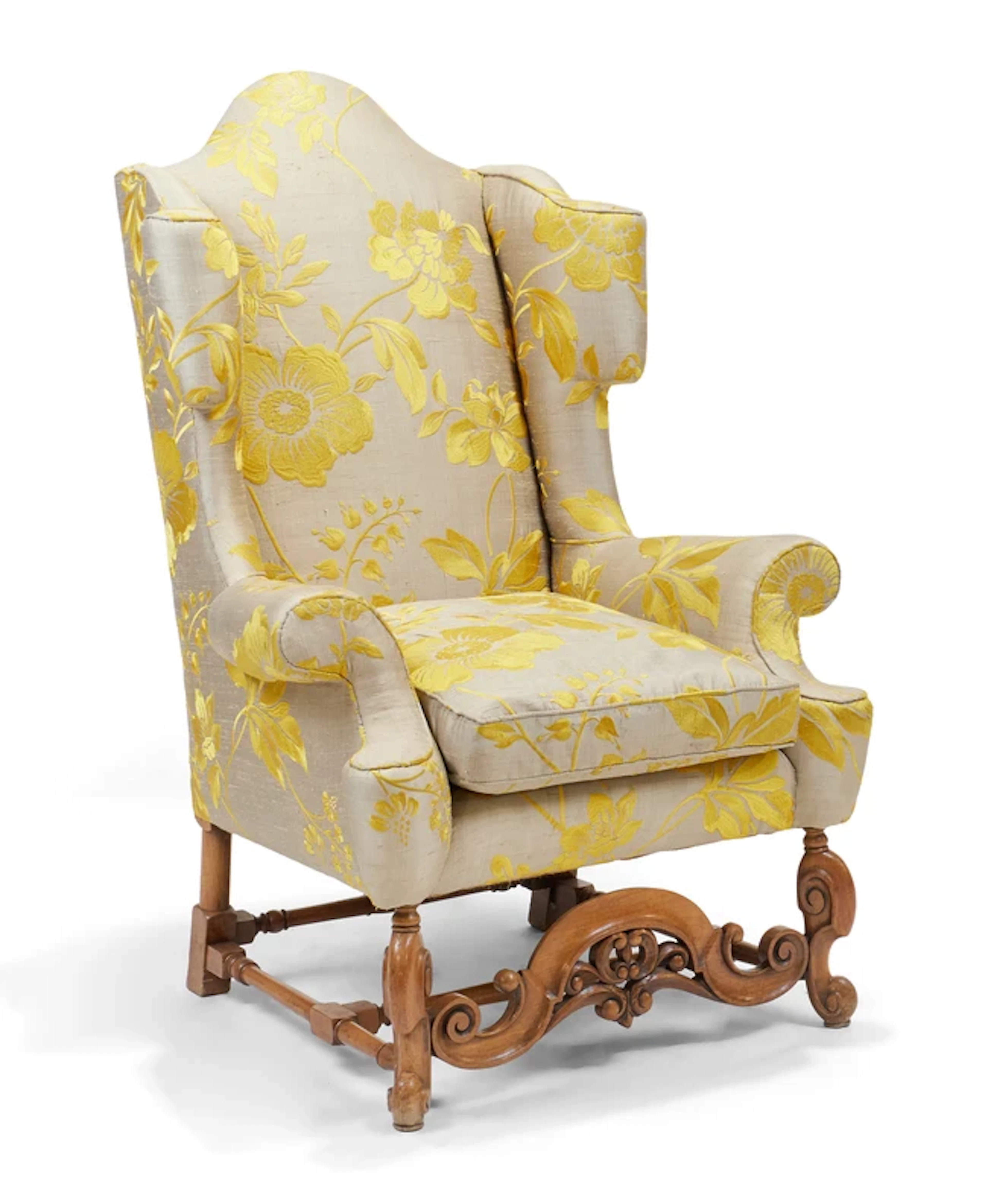 A Victorian walnut wingback armchair