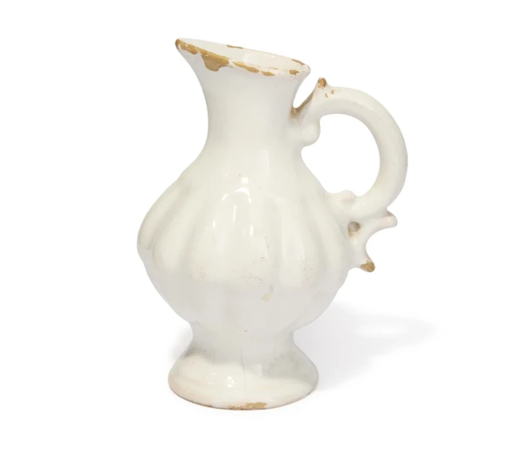 An early Holics white faience jug