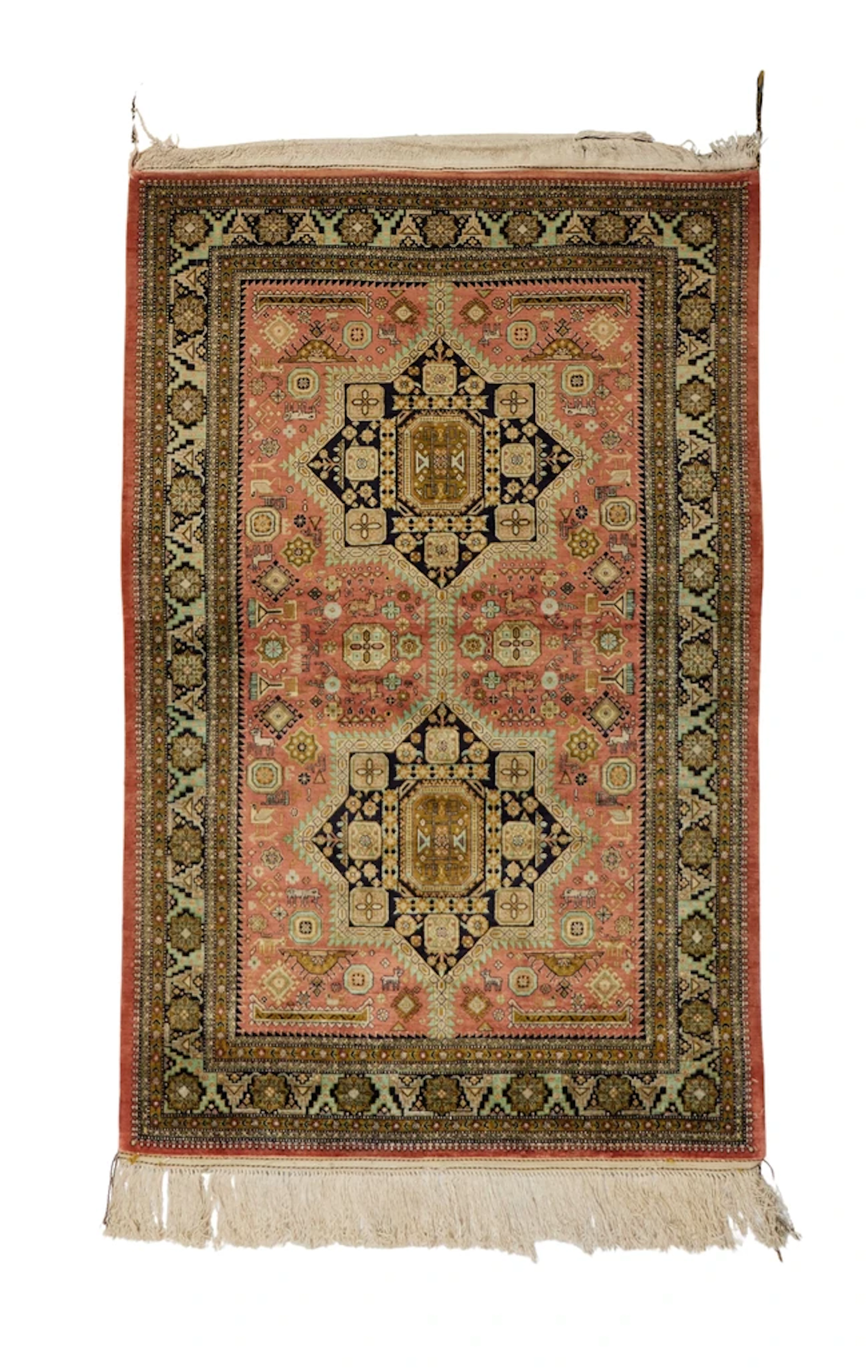 A Persian silk Qum rug