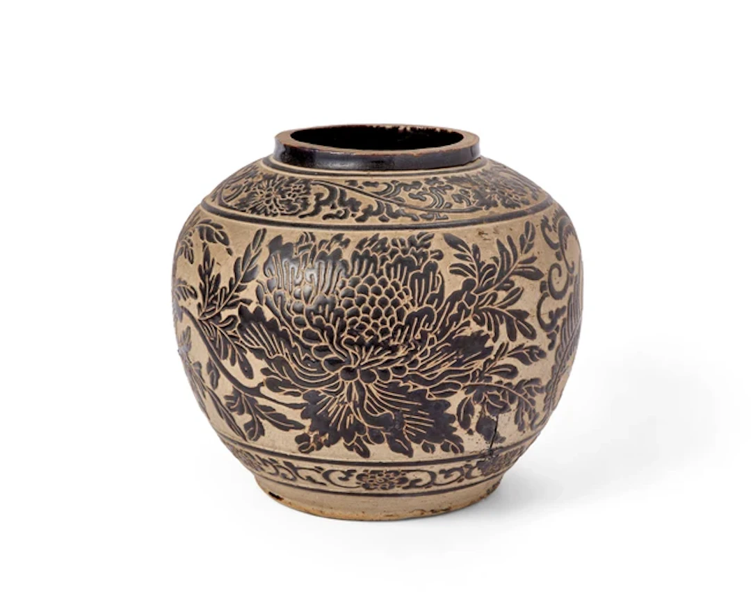 A Chinese Cizhou sgraffiato ‘peony’ jar Yuan dynasty 21.5cm high