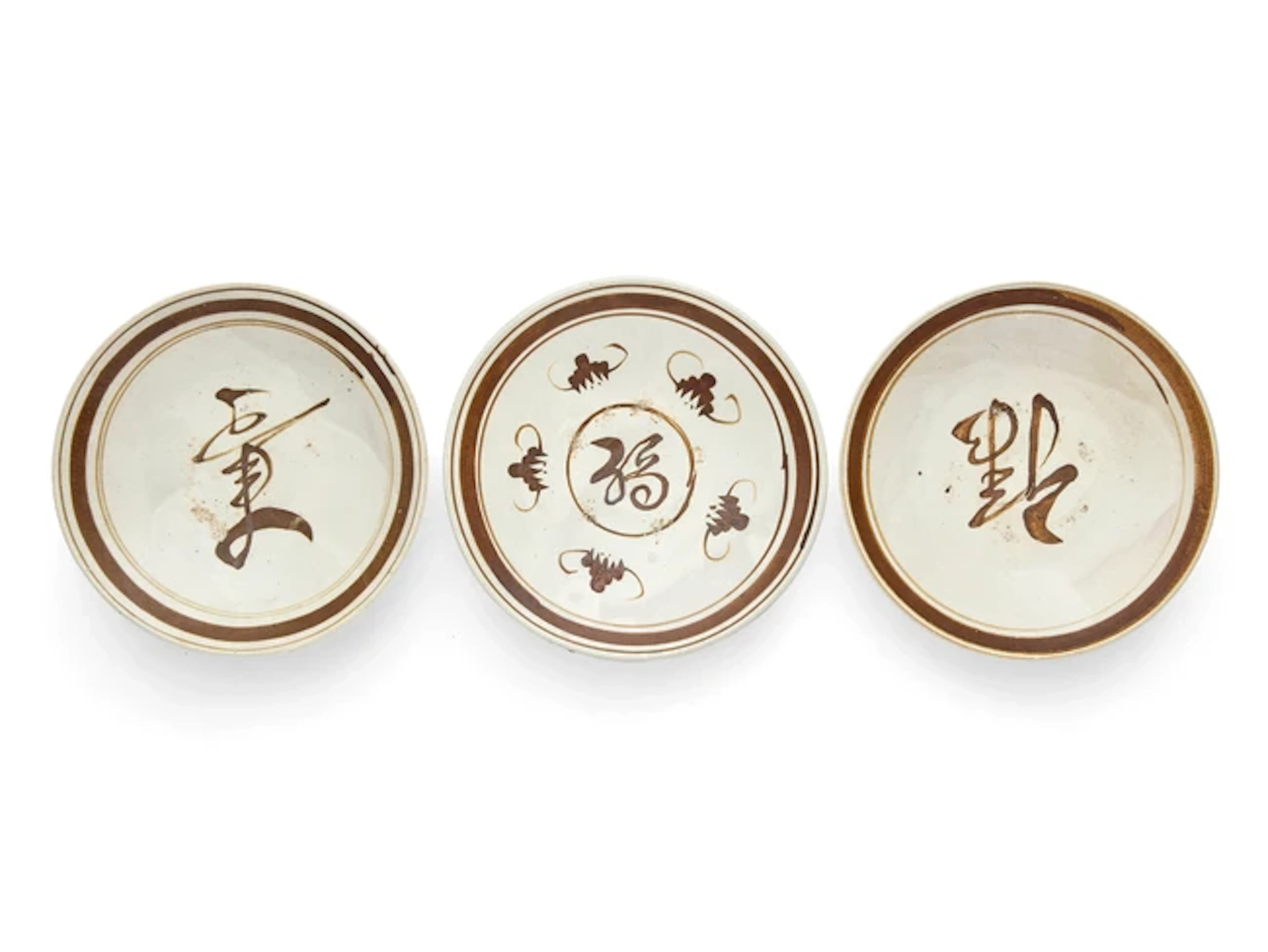 A set of Chinese Cizhou brown-painted 'Fulushou' dishes...