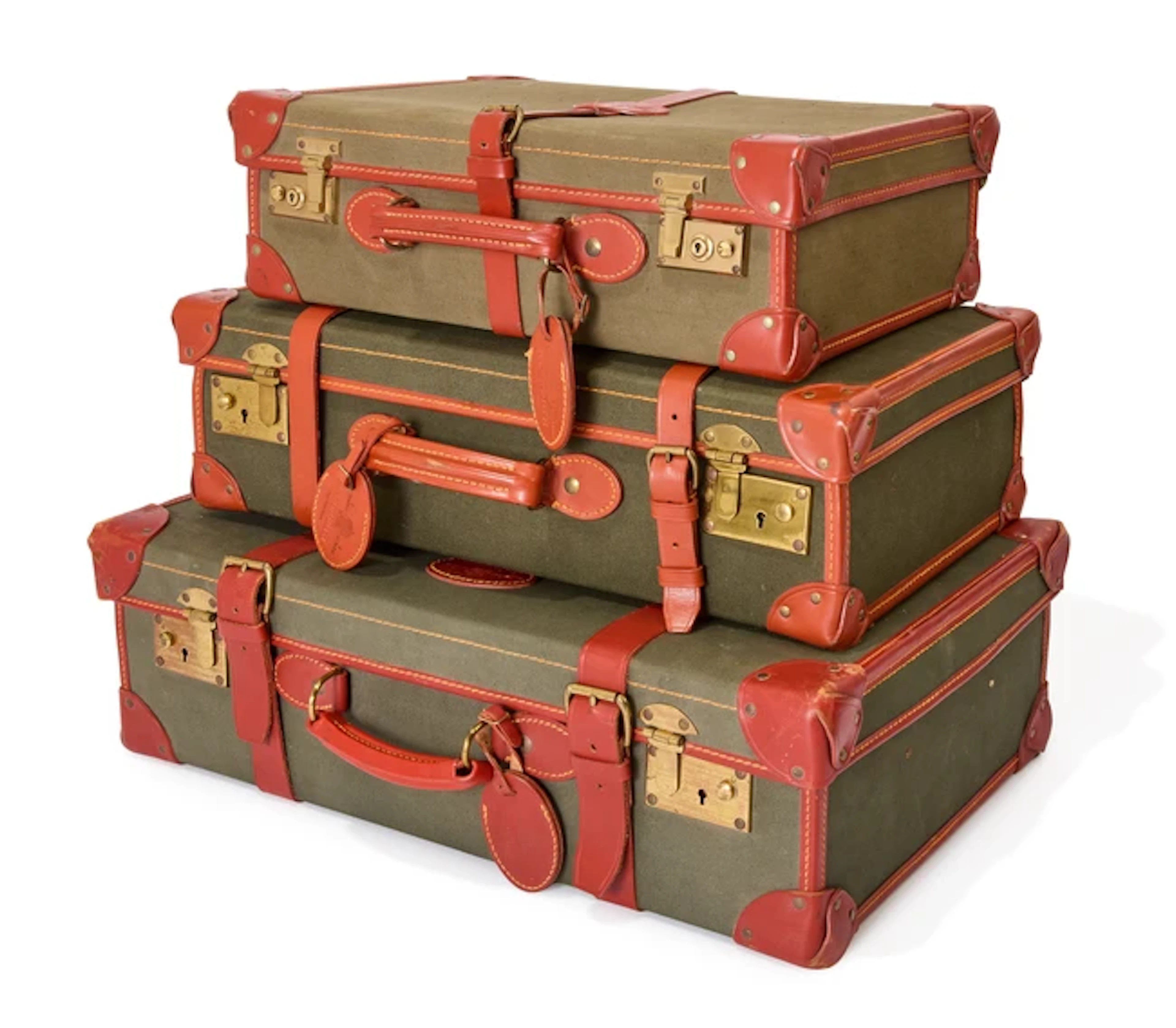 A graduated set of three Papworth Buckden canvas and leather suitcases