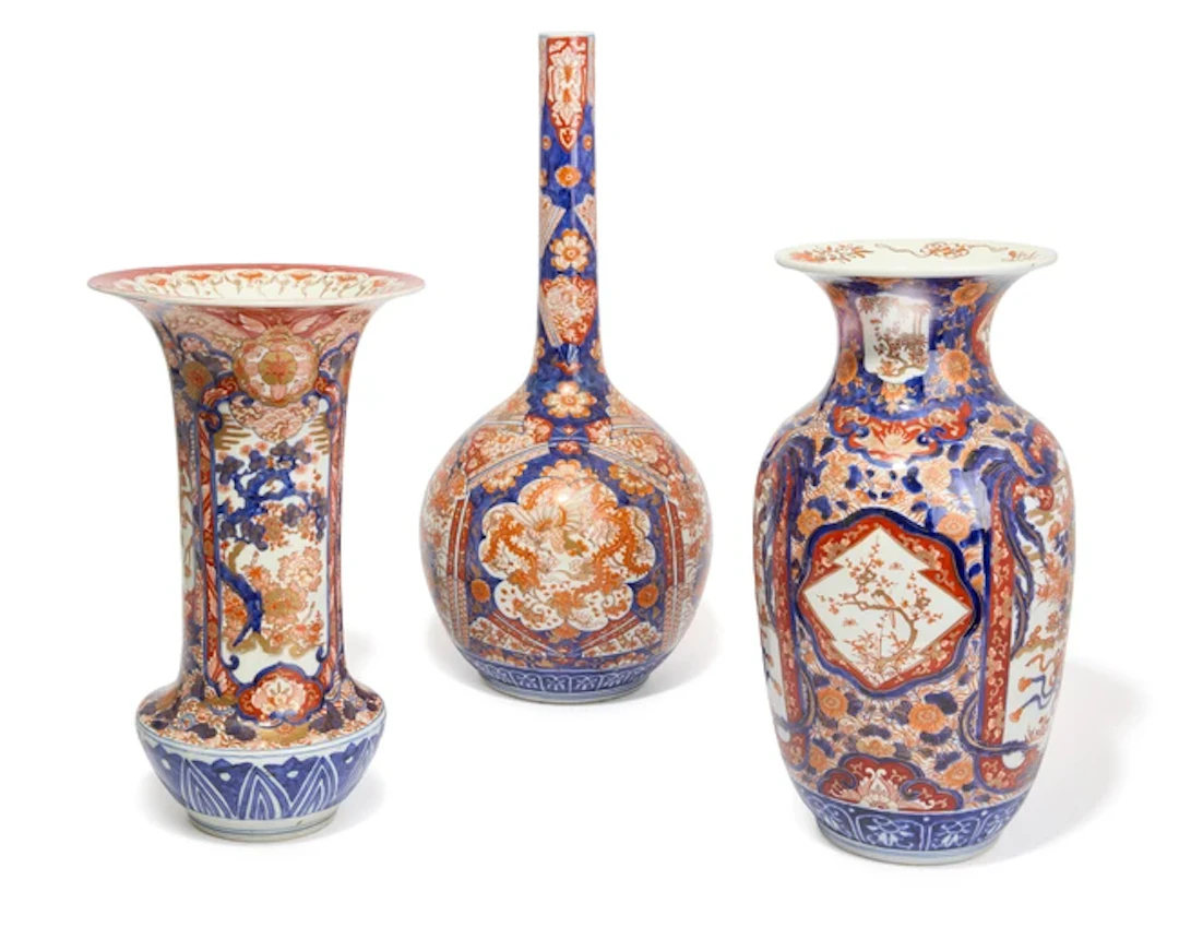 Three large Japanese Imari vases Meiji period Comprising a bottle-vase