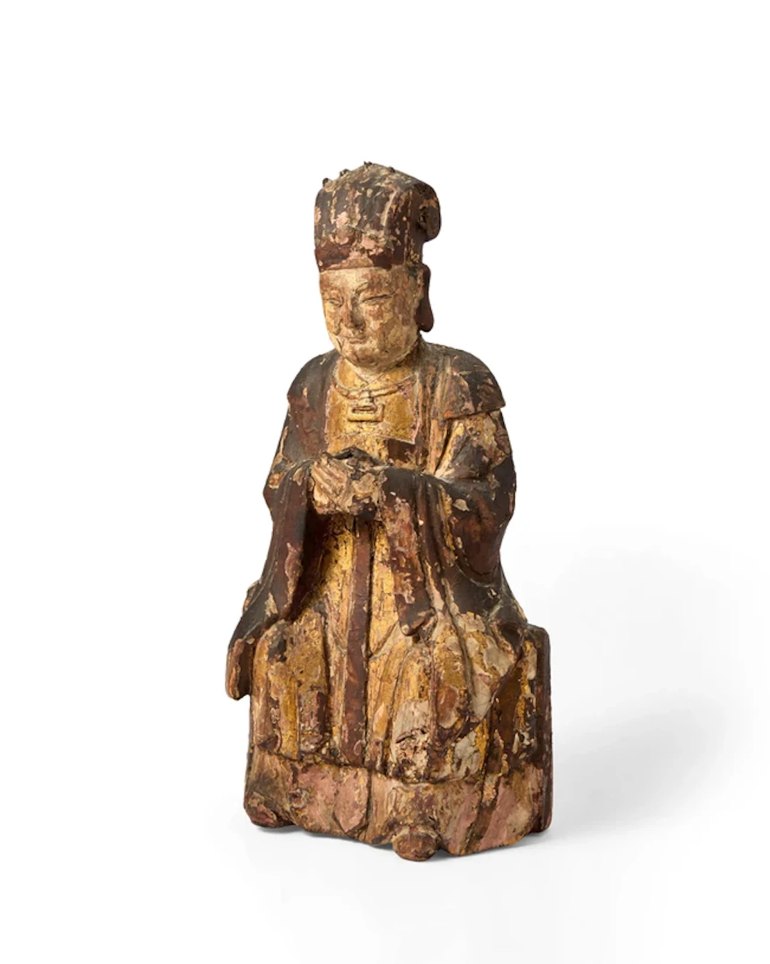A Chinese gilt-lacquered wood figure of a seated official...