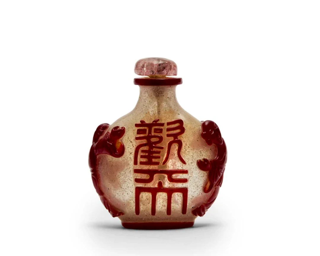 A Chinese red overlay on snowstorm glass snuff bottle Qing dynasty