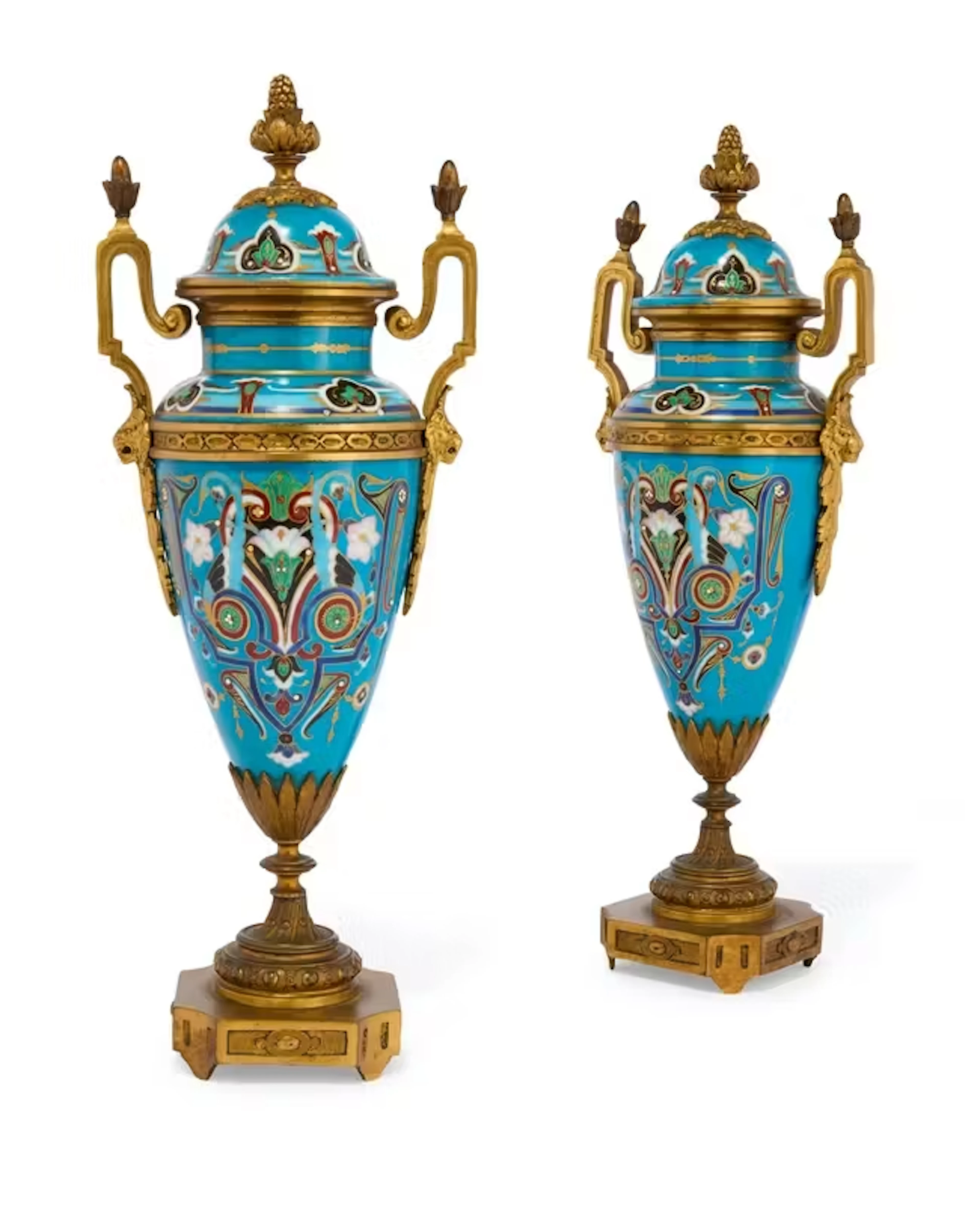 A pair of French gilt-bronze-mounted porcelain urns and covers