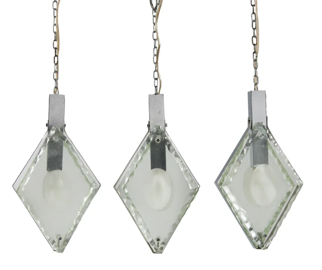 Manner of Max Ingrand Three pendant lights