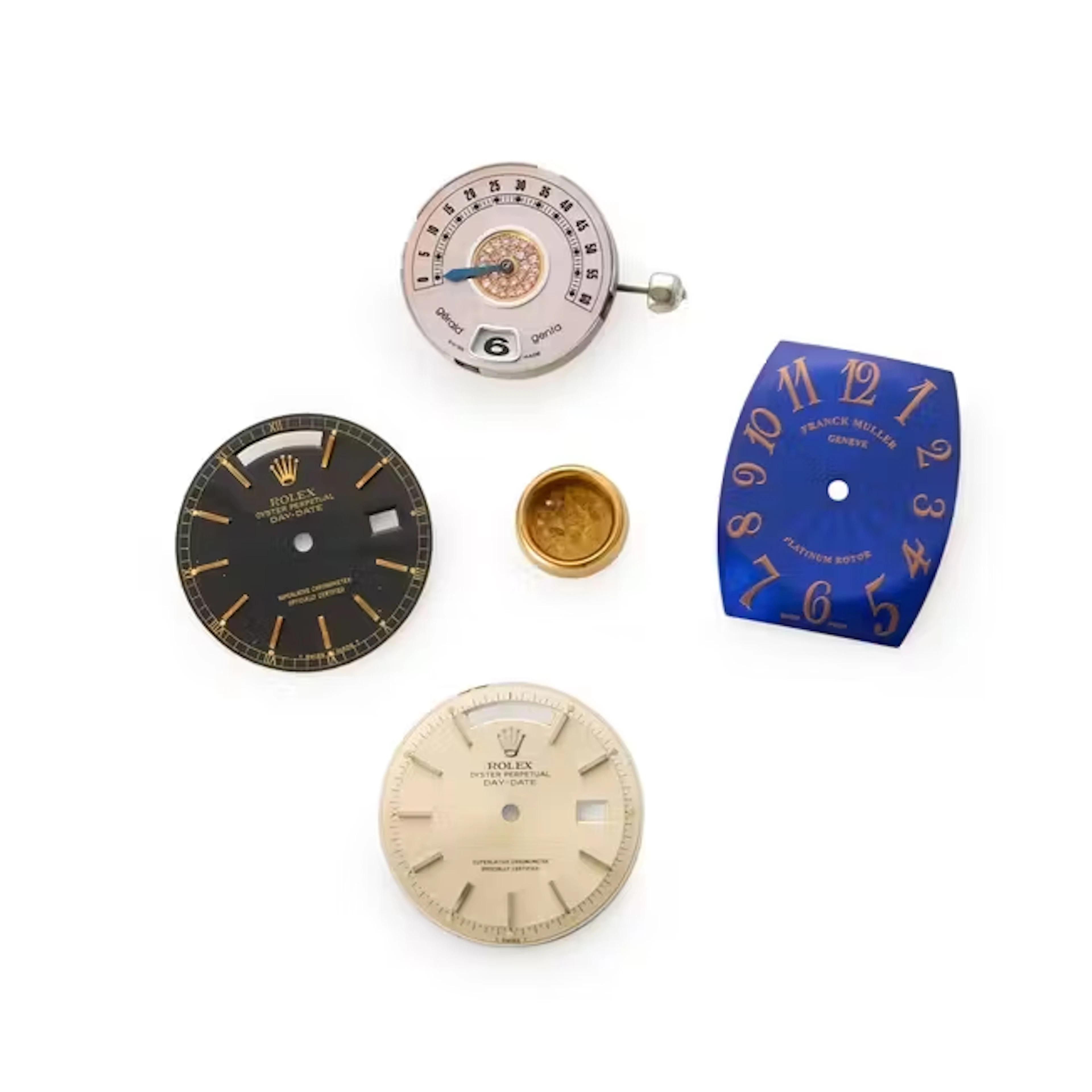 A group of watch parts Comprising: two Rolex Day-Date...