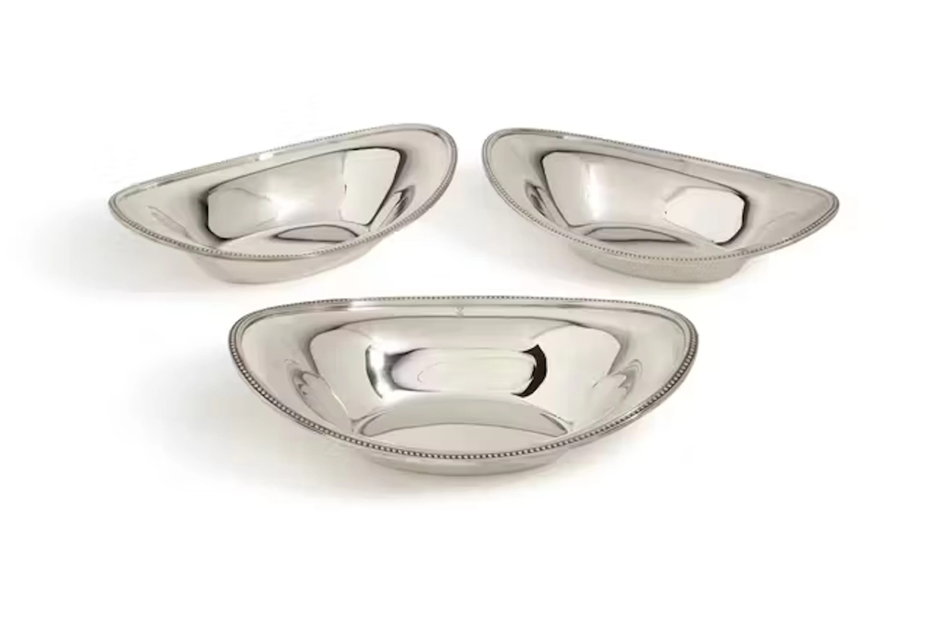 Three French silver-plated navette-shaped serving dishes