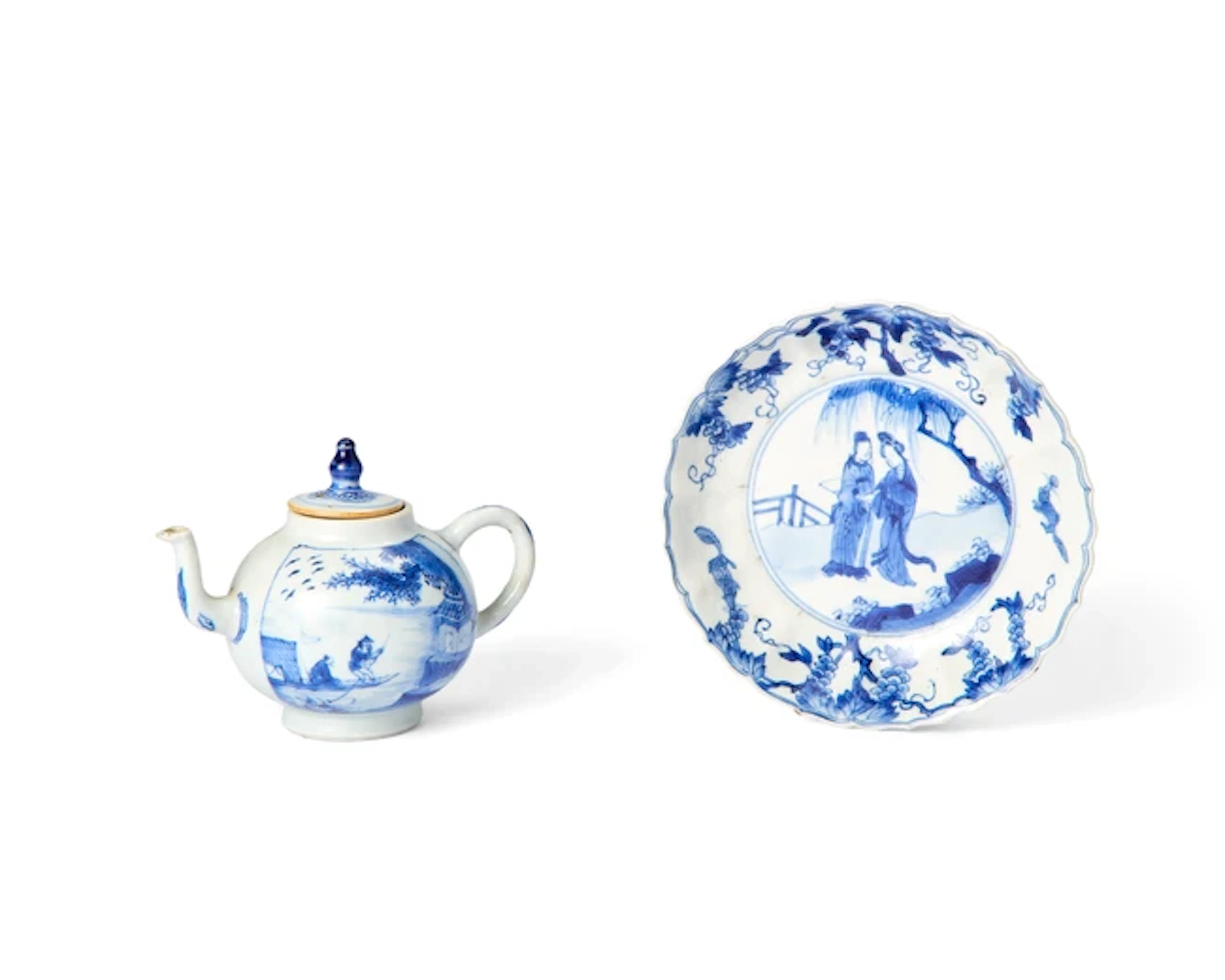 A small Chinese blue and white teapot with associated cover