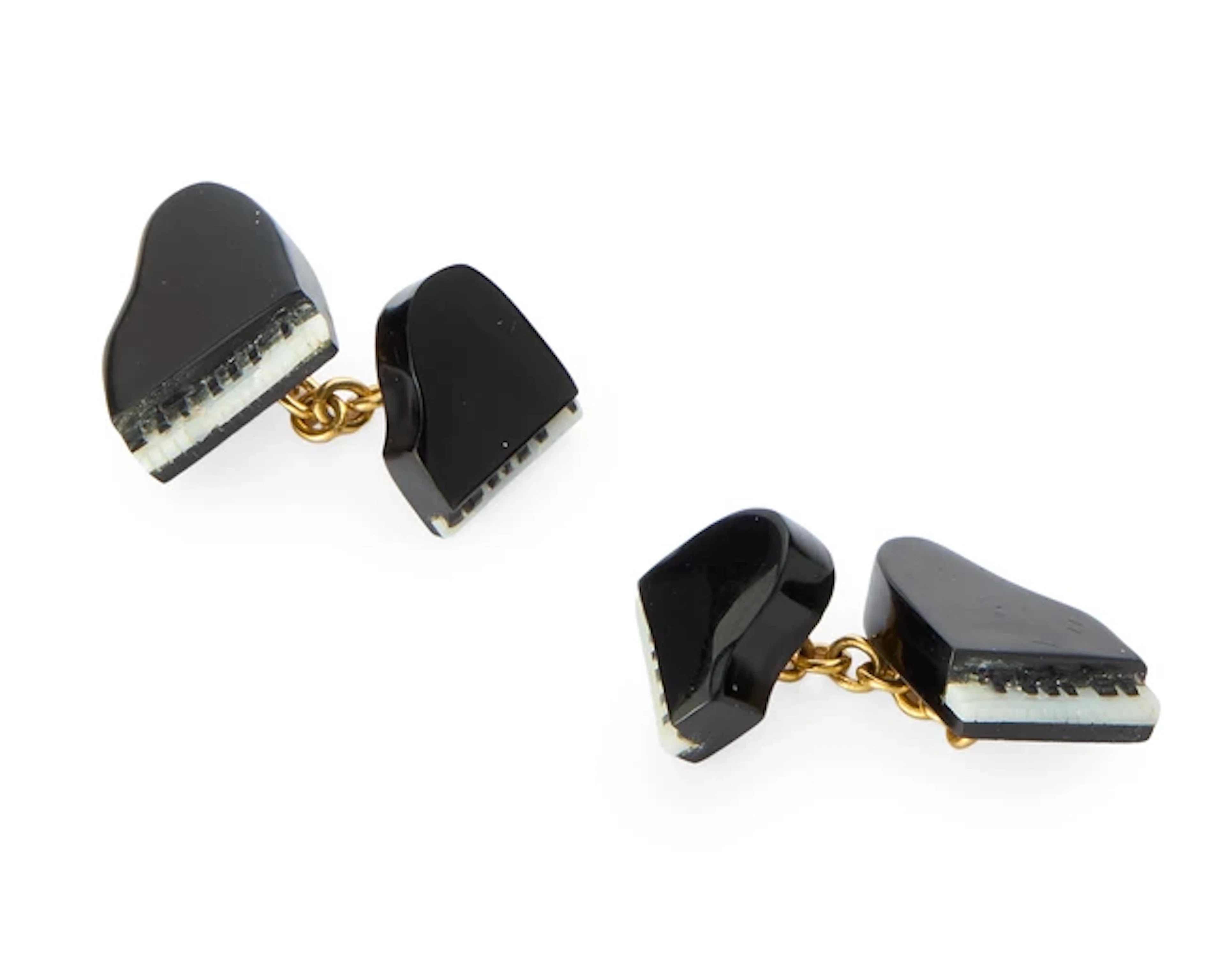 A pair of carved agate novelty cufflinks