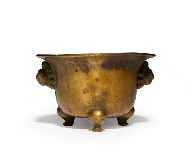 A Chinese bronze tripod incense burner Qing dynasty