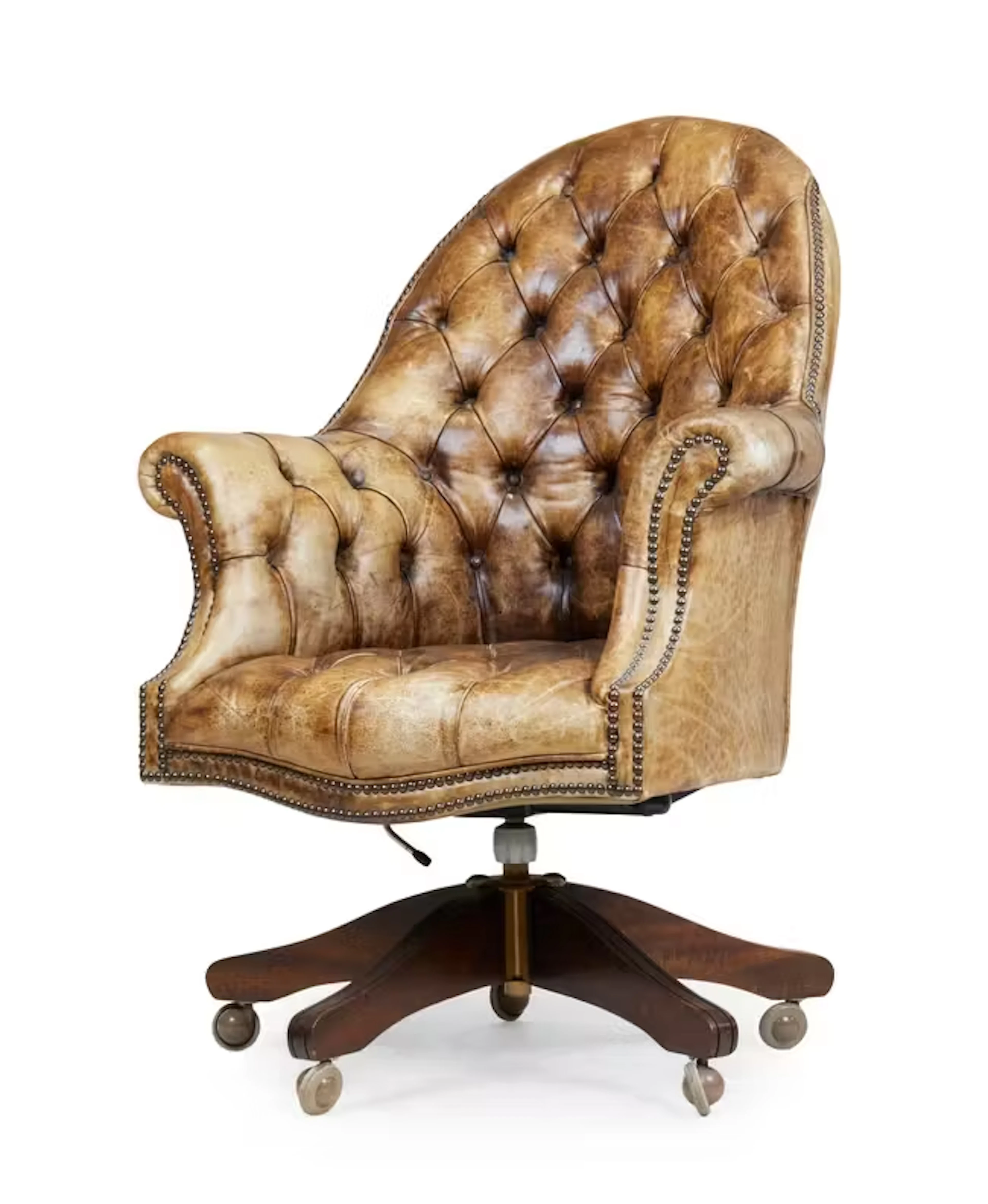 A Norwegian button back leather swivel desk chair