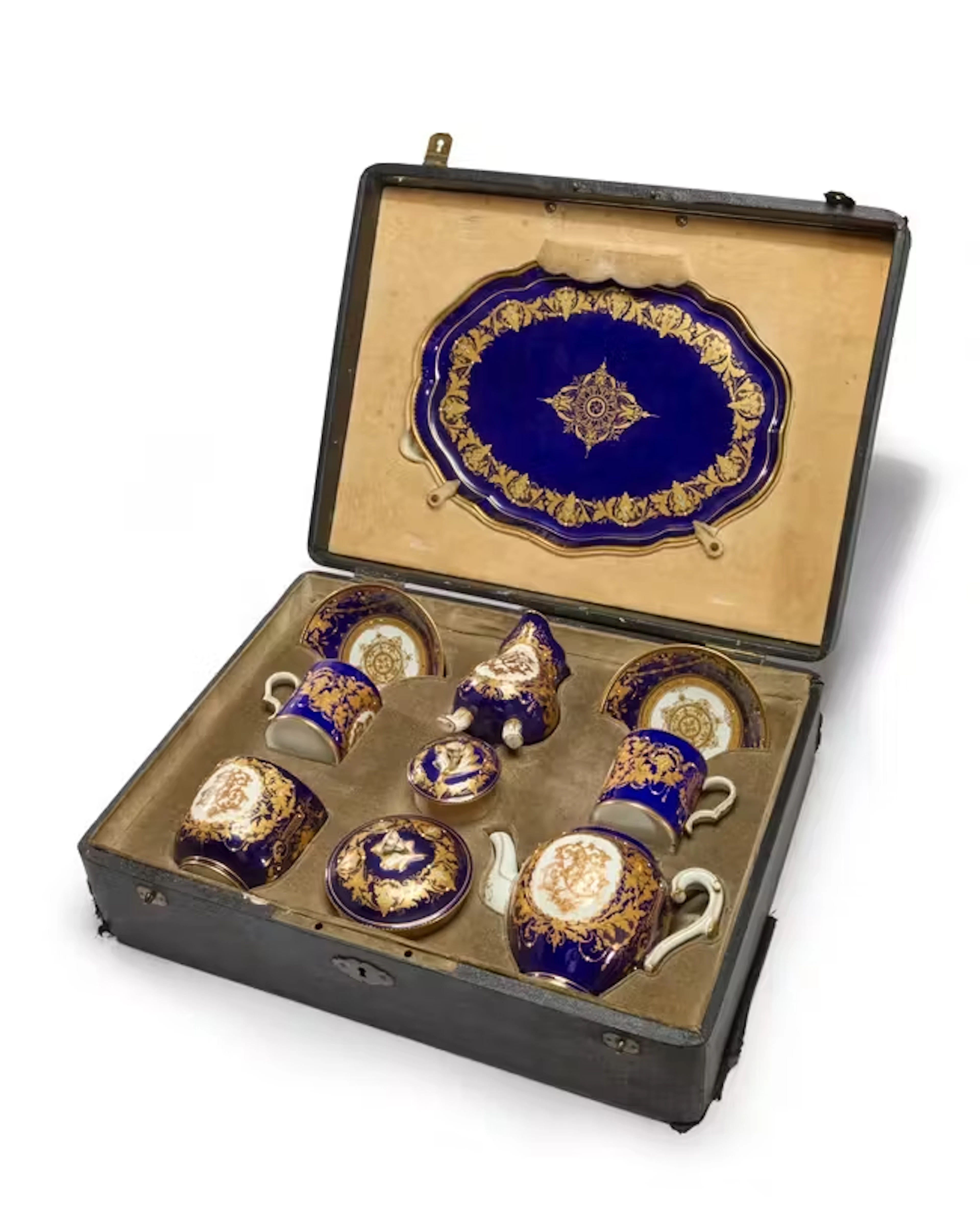 A Sèvres-style porcelain dark-blue-ground travelling tea-service