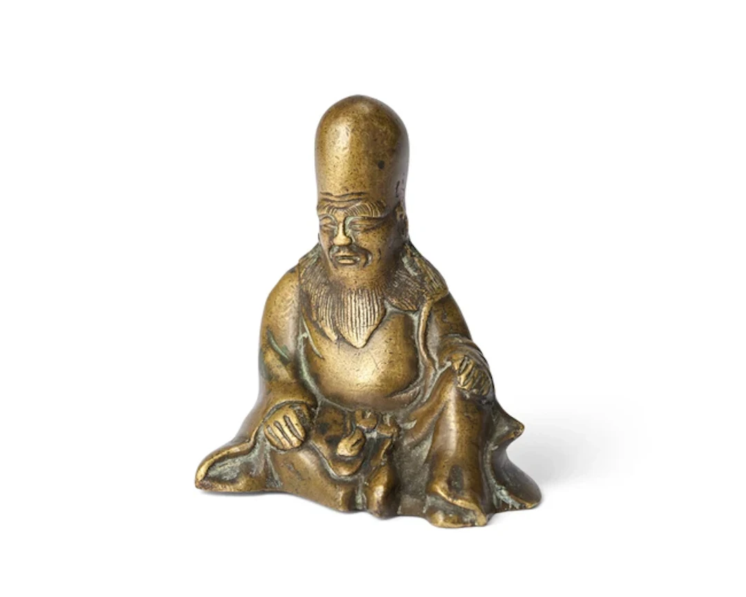 A Chinese bronze Shoulao scroll weight Qing dynasty