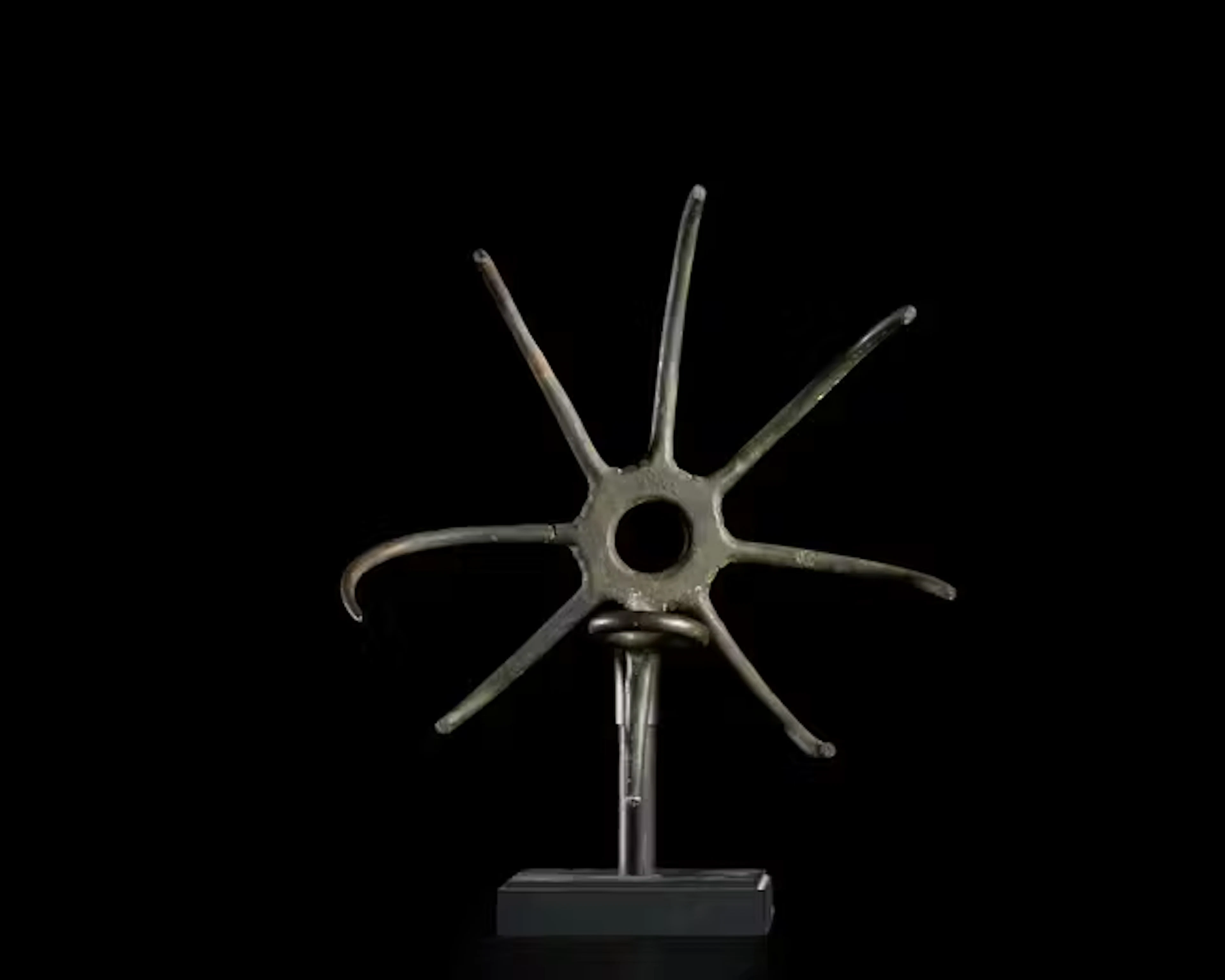 An Etruscan bronze meat hook or torch-holder,Mid-late 5th Century B.C