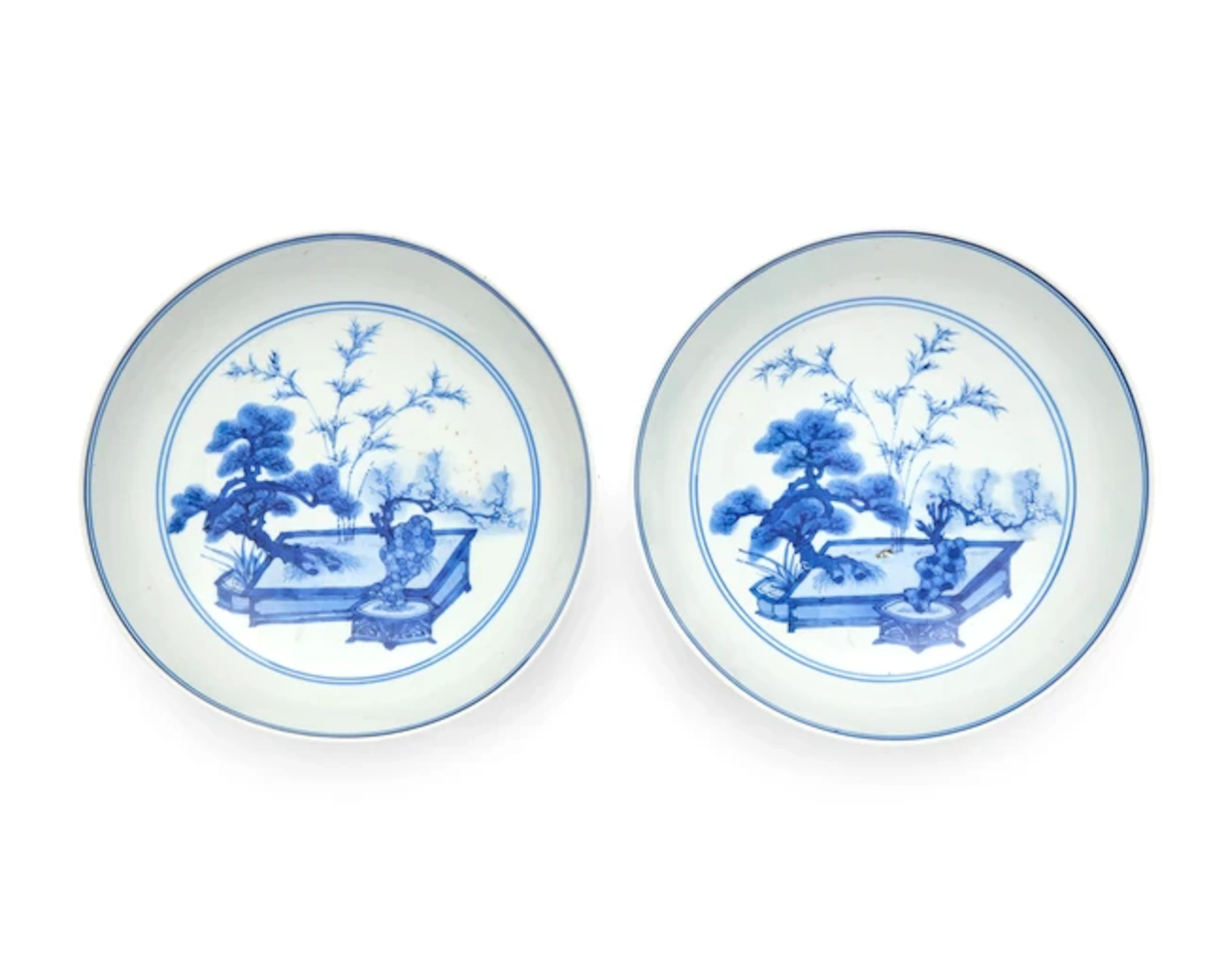 A pair of Chinese blue and white 'three friends' dishes Kangxi period