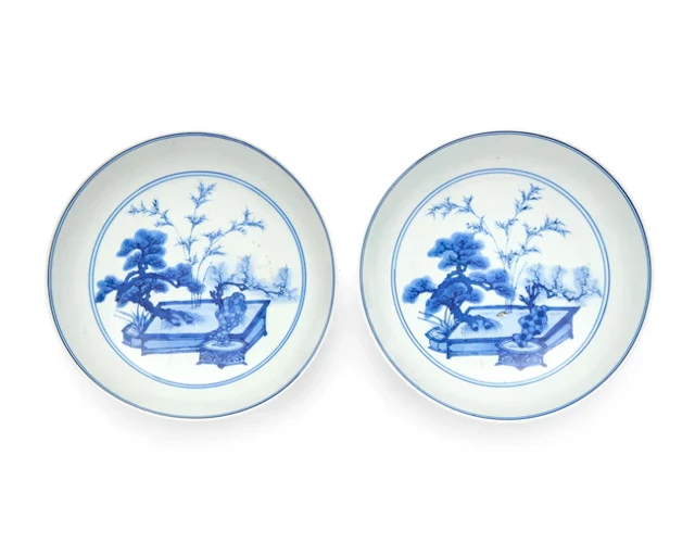 A pair of Chinese blue and white 'three friends' dishes Kangxi period