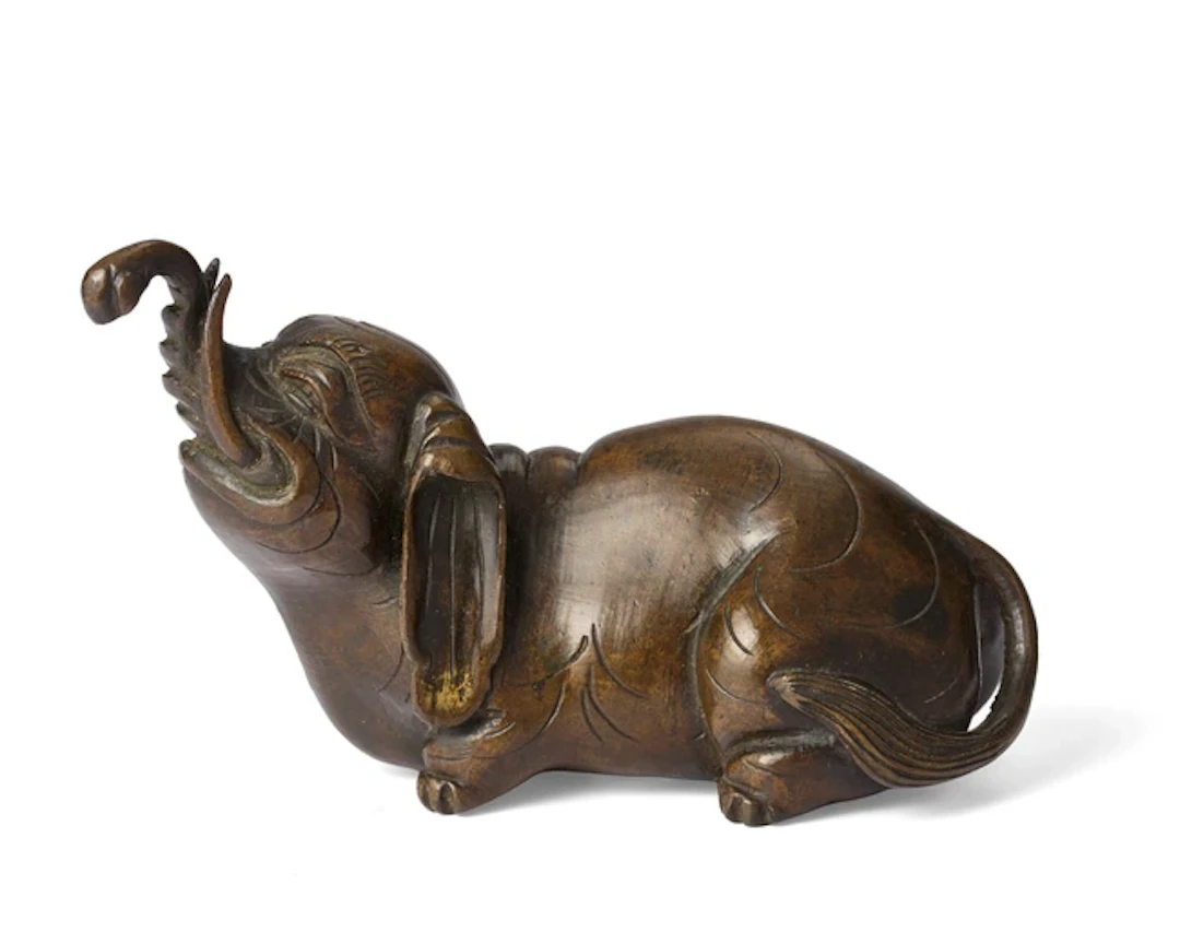 A Chinese bronze elephant paperweight Qing dynasty