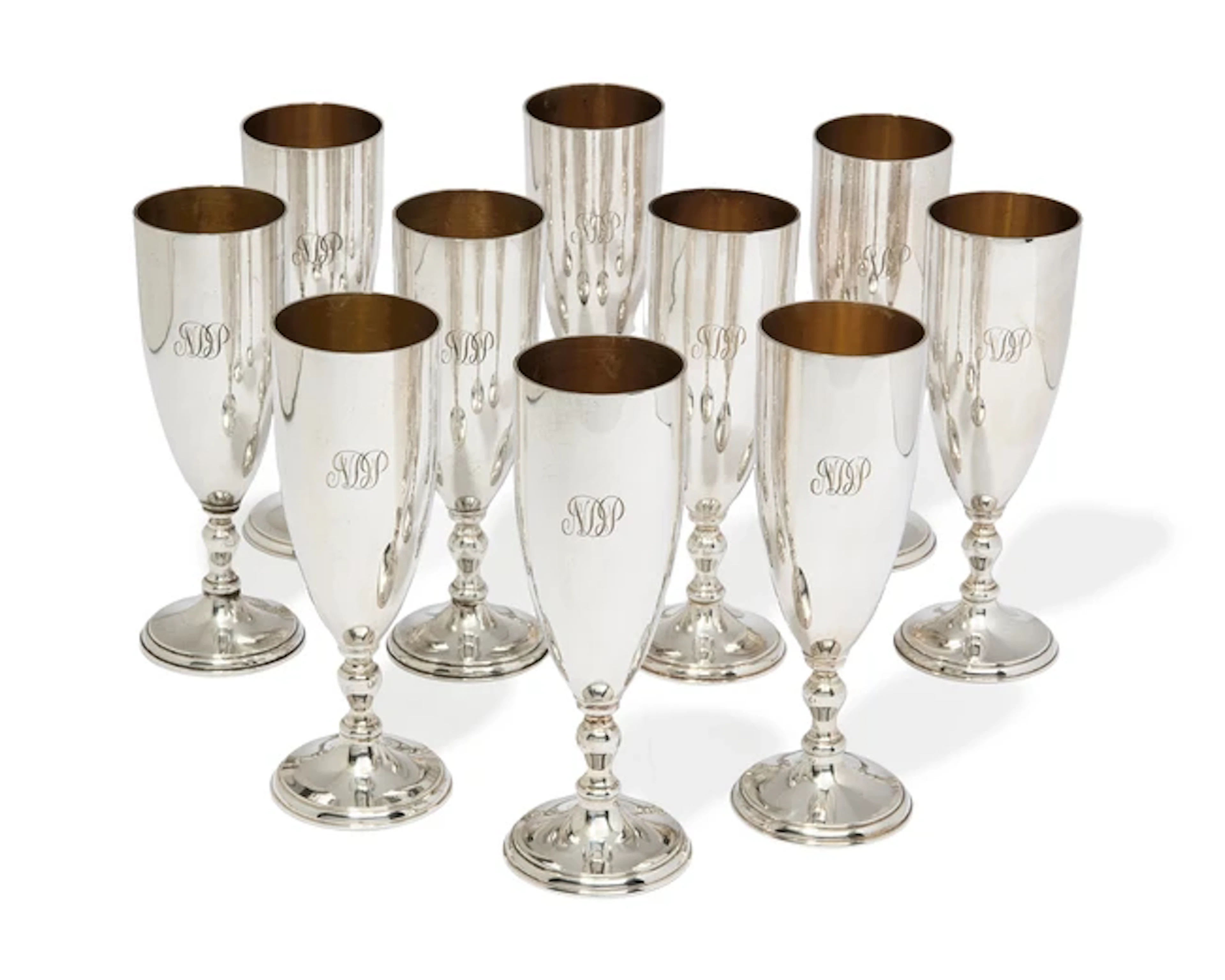 A set of ten Elizabeth II silver champagne flutes