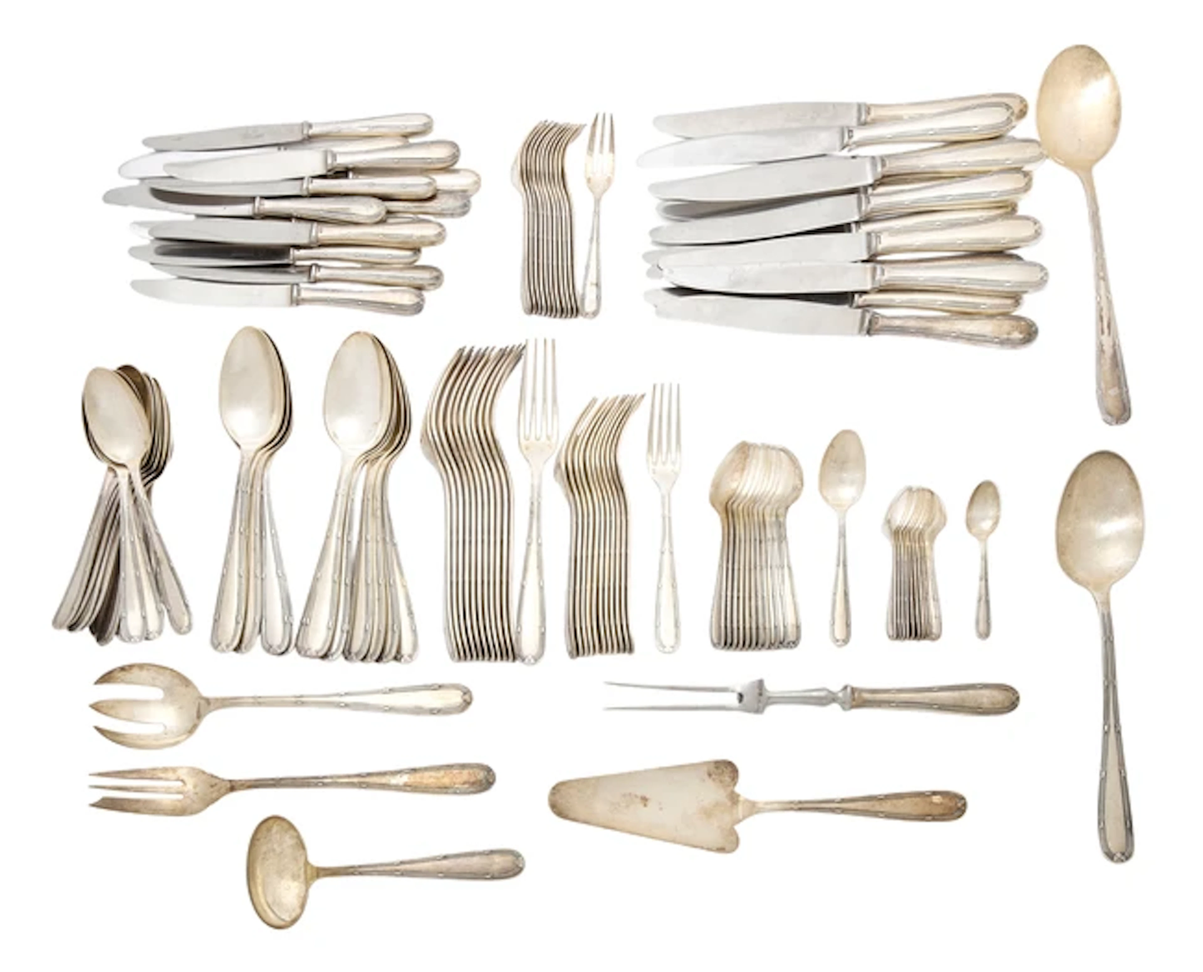 A part service of silver-plated Ribbon and Reed pattern flatware