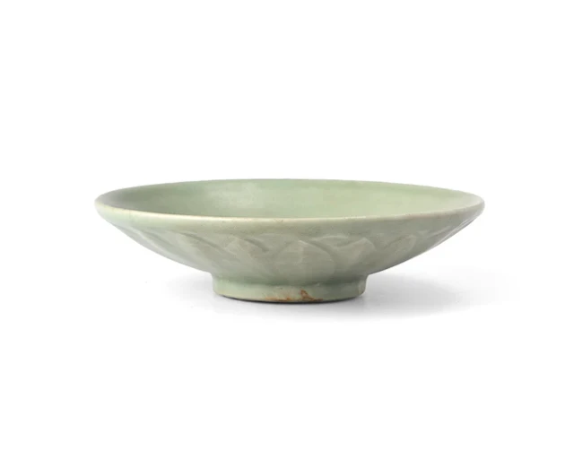 A Chinese Longquan celadon glazed petal-moulded dish Song...