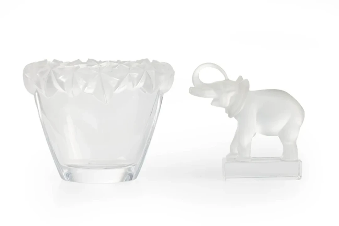 Sevres Tapered vase with foliate rim and a Lalique model of an elephant