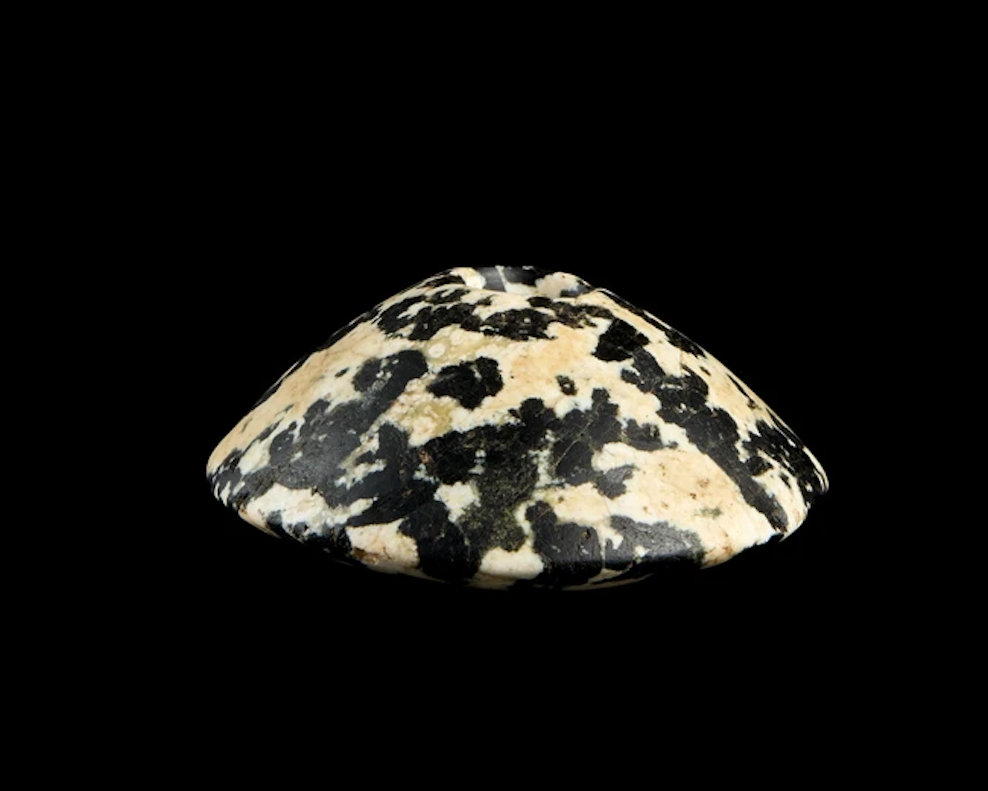 An Egyptian Predynastic diorite macehead with slightly...