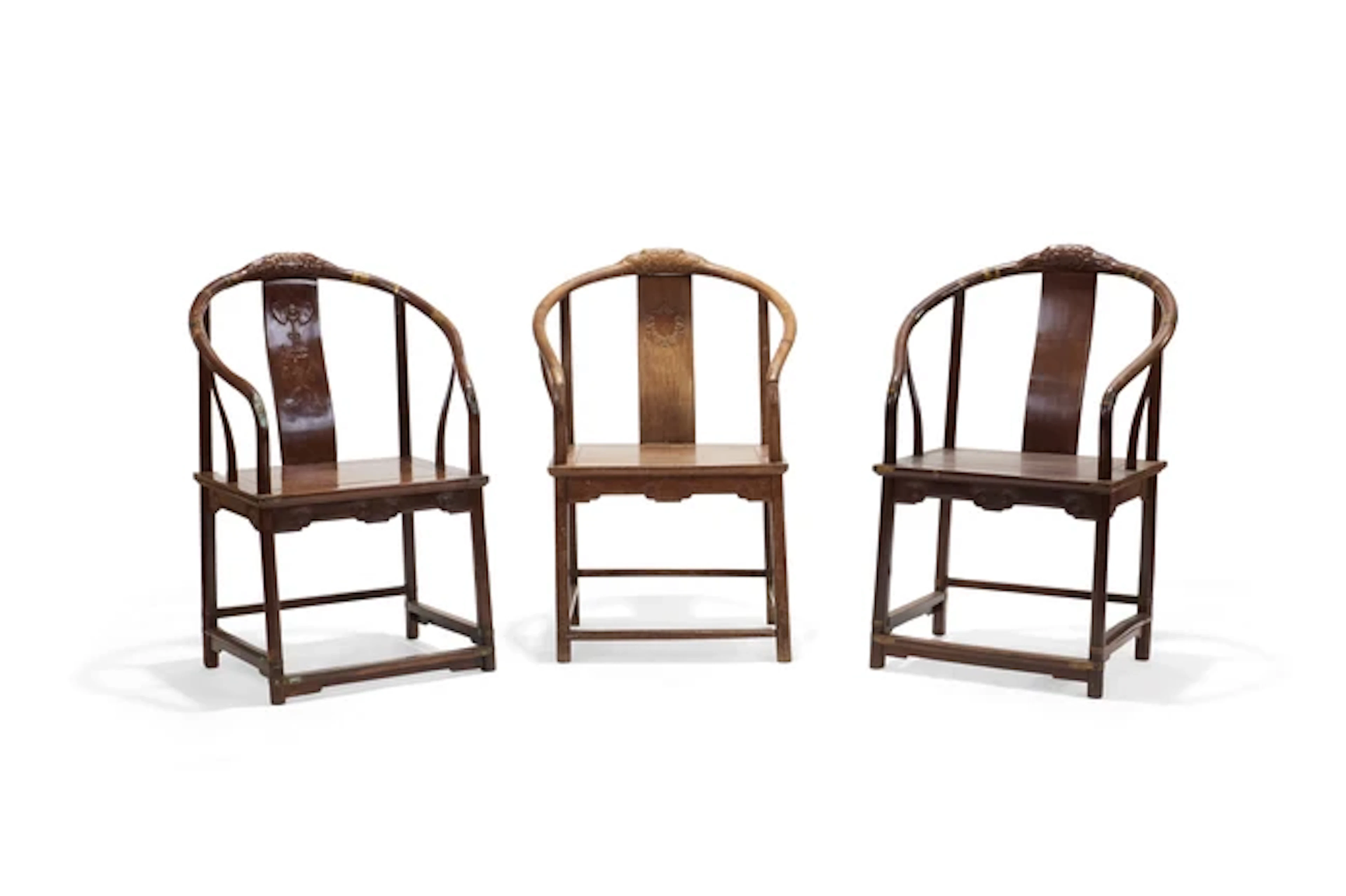 Three similar Chinese hongmu horseshoe back armchairs...