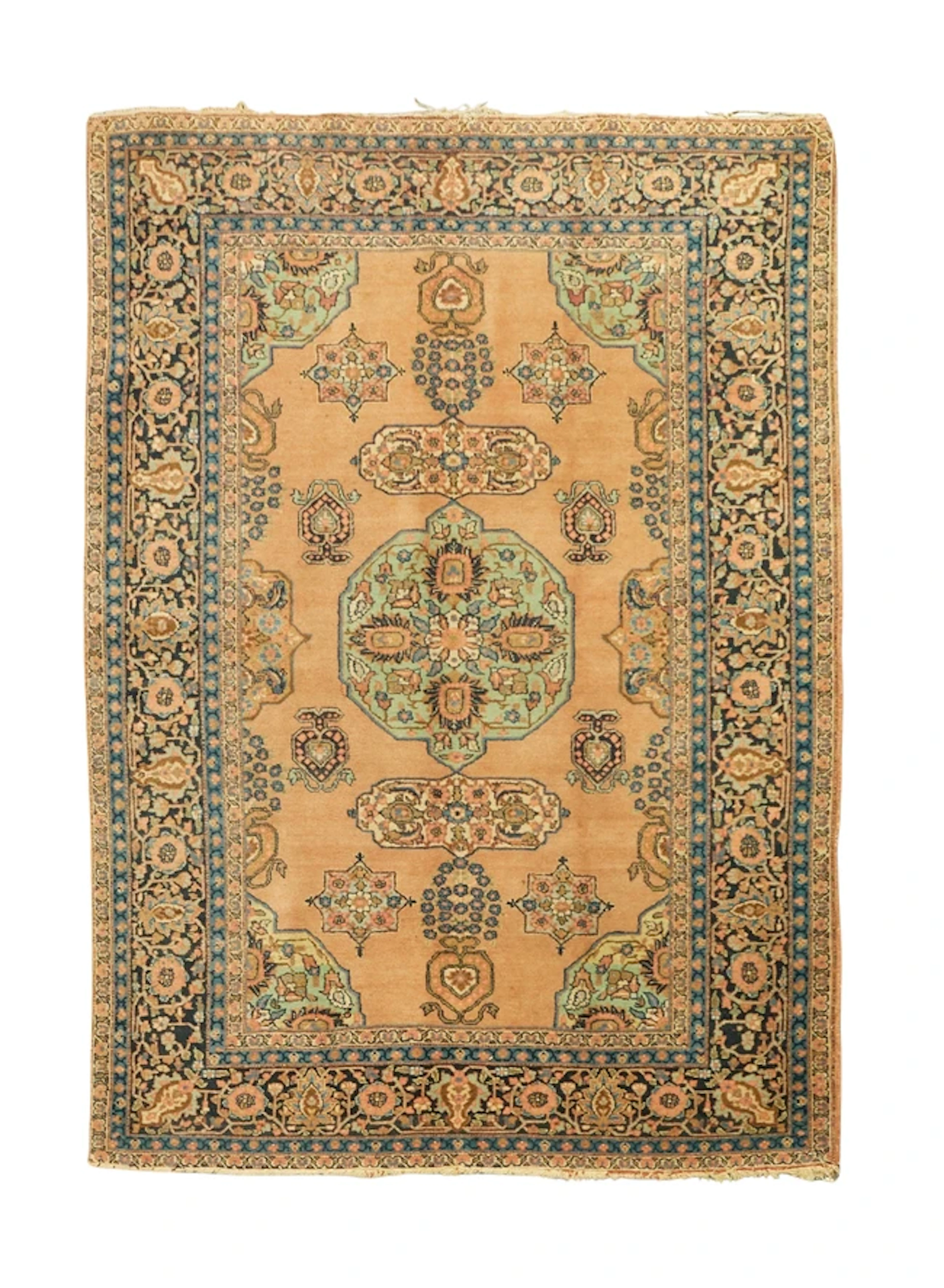 A Persian Tabriz rug