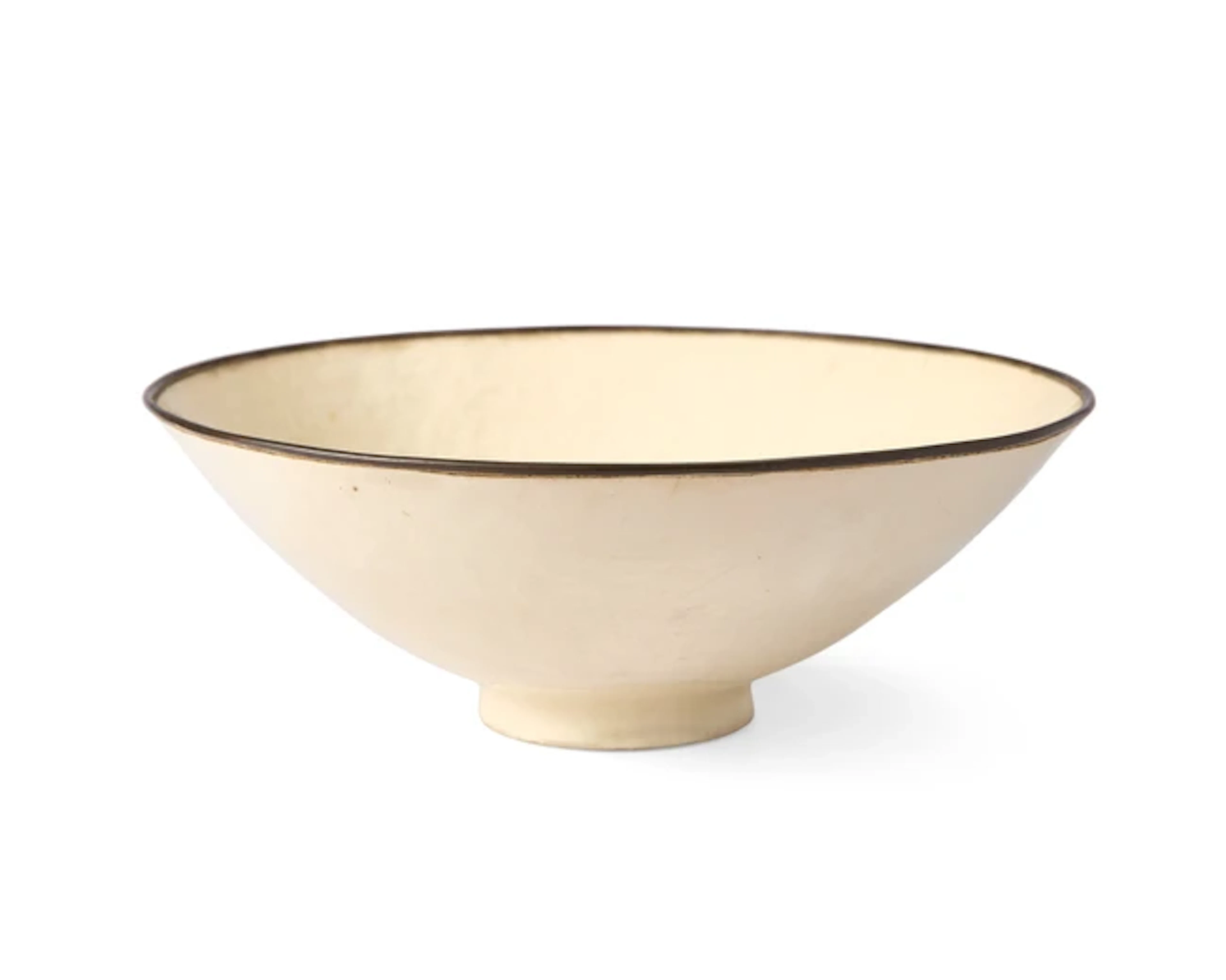 A large Chinese Dingyao moulded 'fish and lotus' bowl...