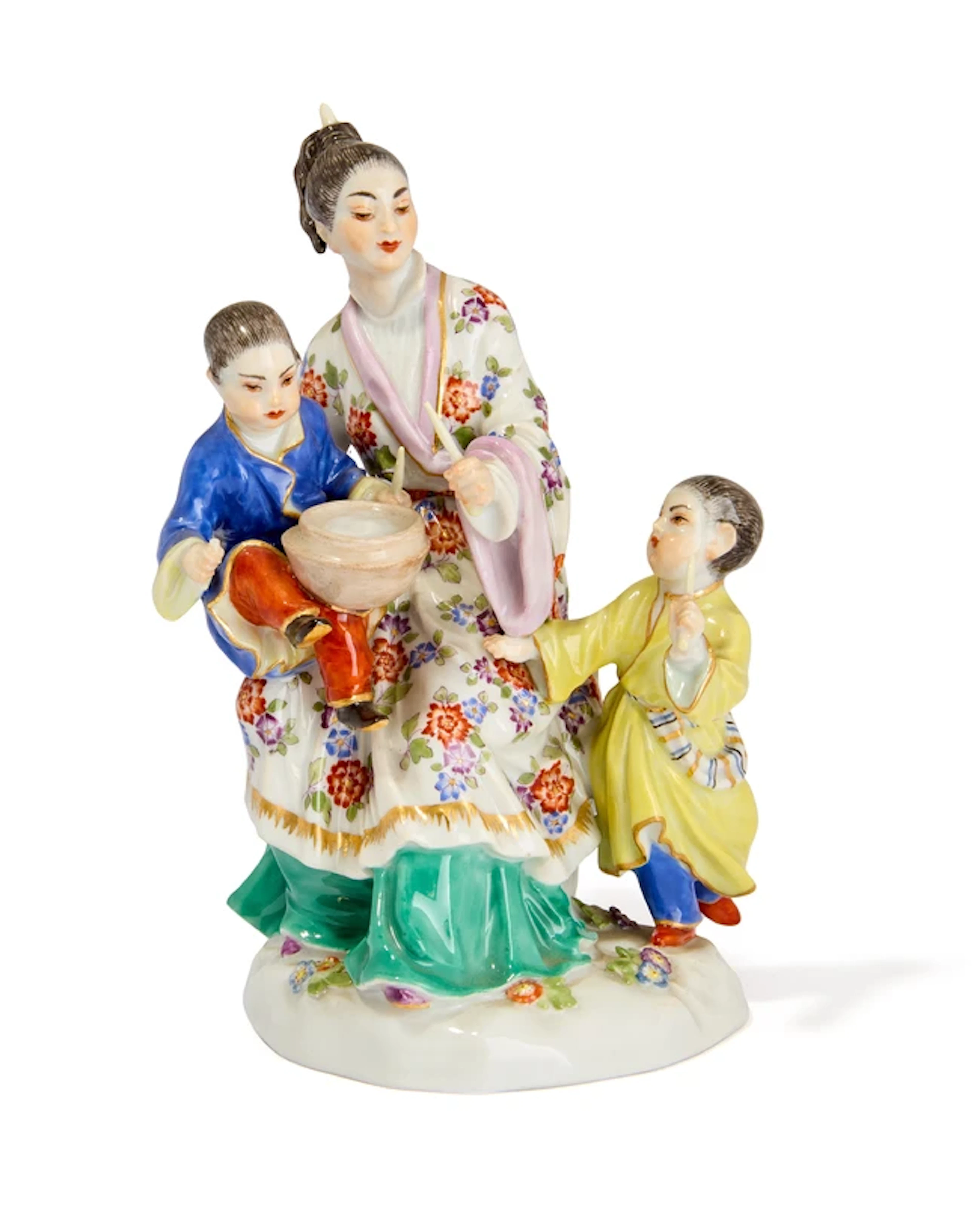 A Meissen porcelain figure group of a Japanese woman with children