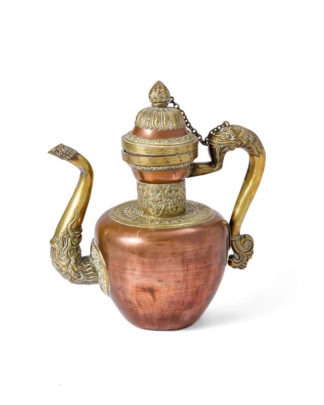 A Tibetan copper-alloy butter teapot 19th/20th century...