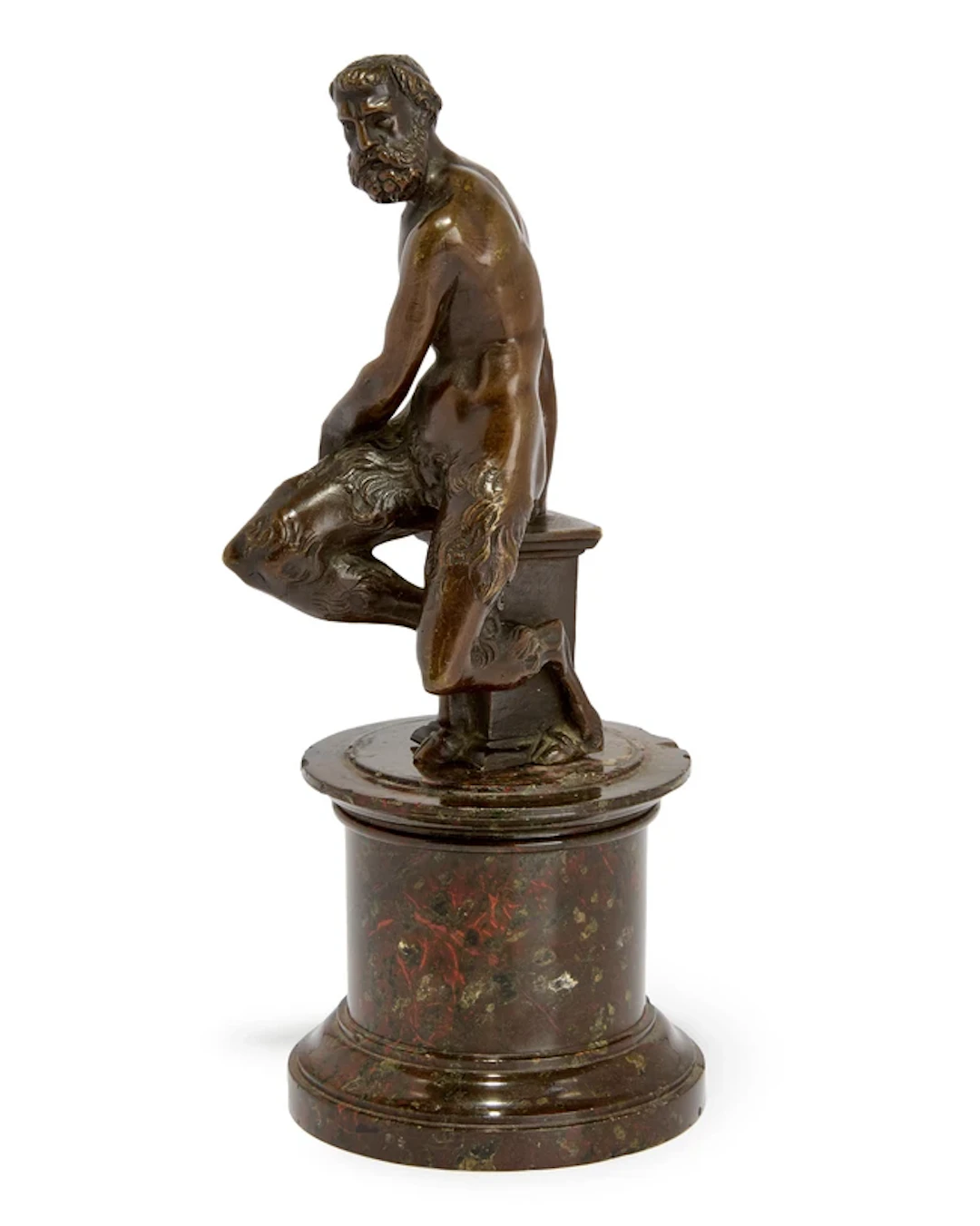 A bronze figure of seated satyr