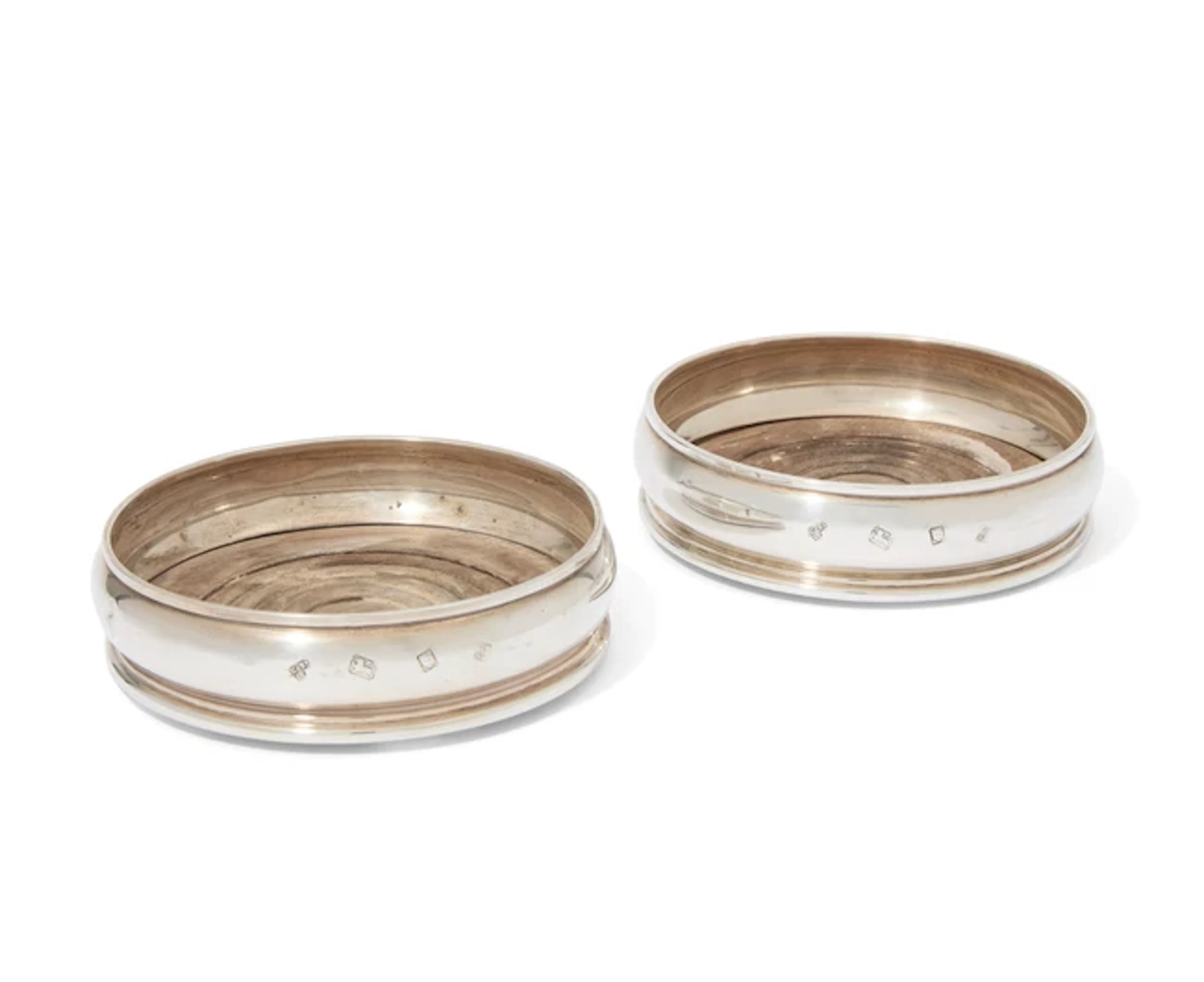 A pair of Elizabeth II silver wine coasters